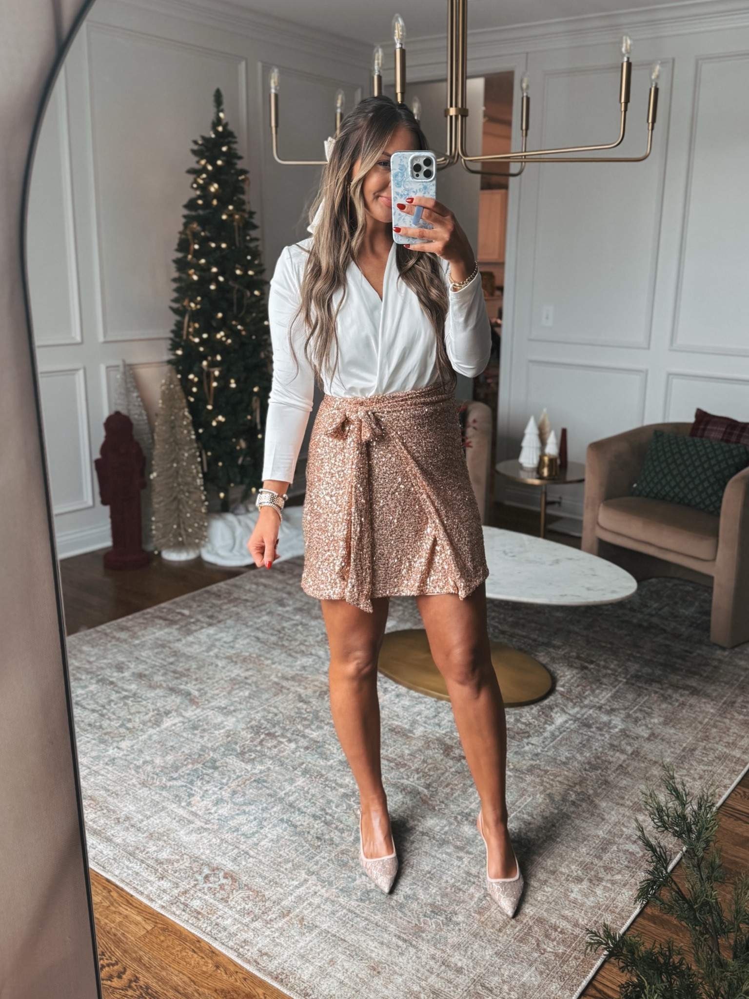 This is such a fun look for a date night, holiday party or NYE outfit. The wrap top and skirt are so flattering and has just the right amount of shimmer. These sheer kitten heels are a closet staple for when you want a nicer neutral show.

#LTKFindsUnder50 #LTKStyleTip #LTKHoliday