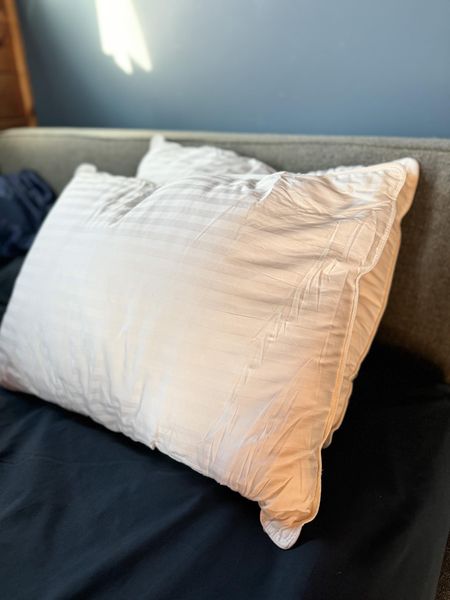 Hotel pillows are the best! 
Fashionablylatemom 
Beckham Hotel Collection Bed Pillows Standard / Queen Size Set of 2 - Down Alternative Bedding Gel Cooling Pillow for Back, Stomach or Side Sleepers
Cotton
SUPERIOR COMFORT - Queen pillows have a 250 thread count cover filled with a soft down alternative. One of the best first apartment or new home essentials gift for bedroom, guest bed room, college dorm or house decor.
KEEP COOL - If you easily overheat, or maybe you're looking for cool queen size pillows for night sweats, the breathability of our standard bed pillow can offer welcome relief.

#LTKsalealert