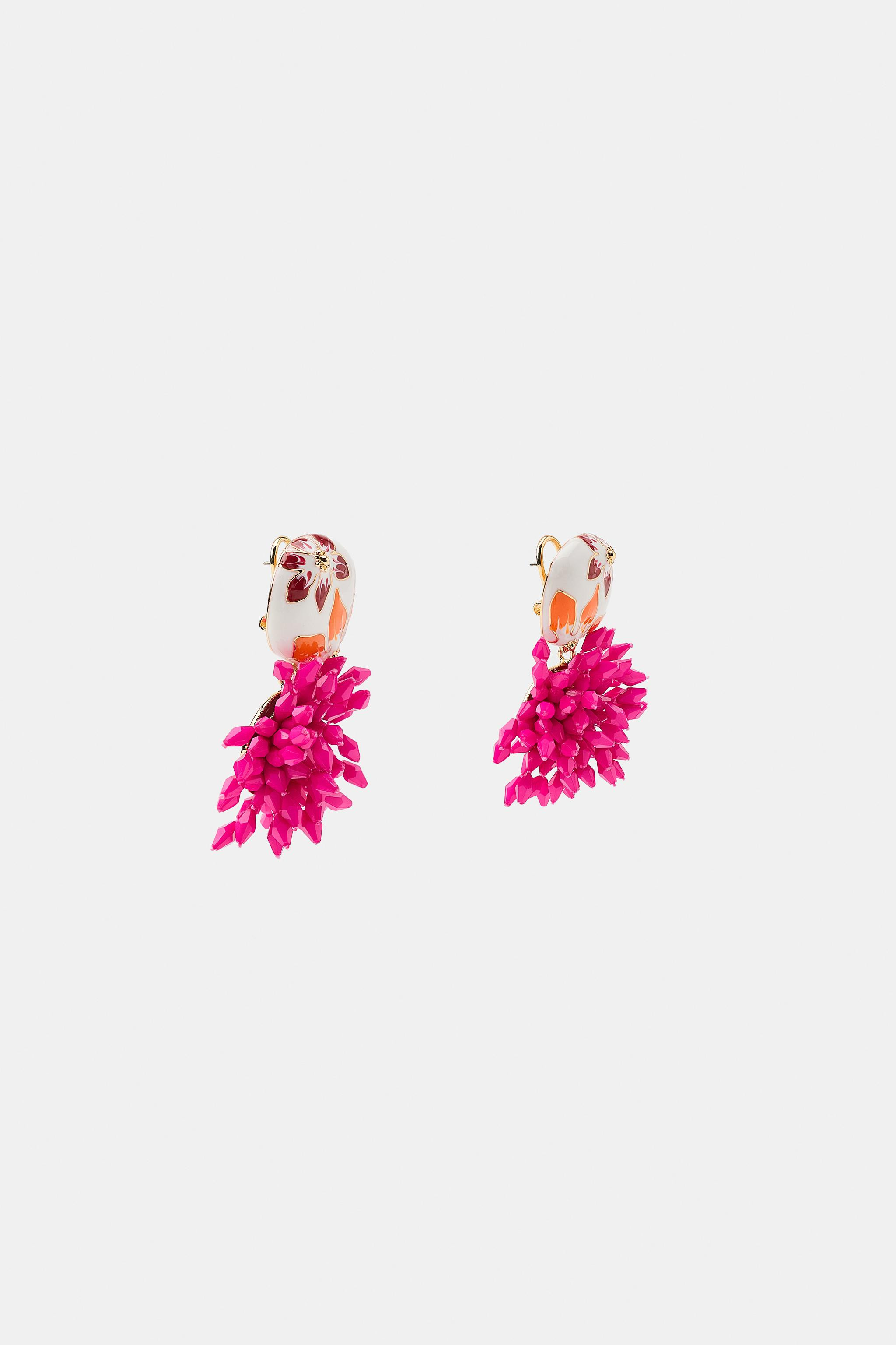 Metal stud earrings with a coloured resin piece. Featuring contrasting multi-bead dangles. Butter... | Zara UK