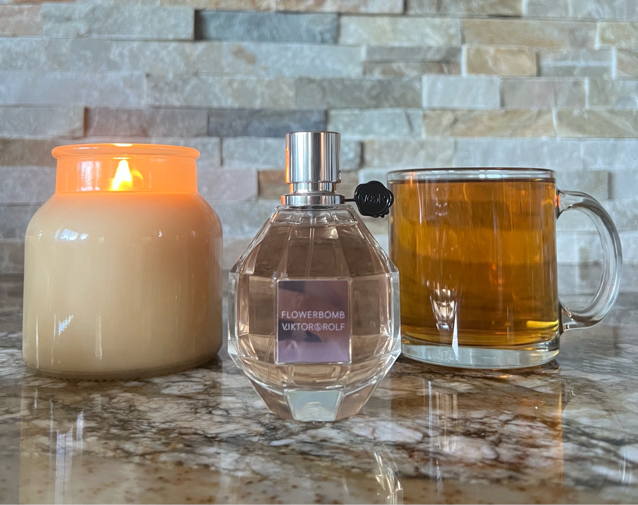 Flowerbomb is the debut fragrance from Amsterdam-based design team Viktor & Rolf. It was created by perfumers Olivier Polge, Carlos Benaim and Domitille Bertier and has notes of tea, bergamot, sambac jasmine, orange tree, catleya orchid, freesia, rose, and amber, musk, and patchouli.

#LTKWorkwear #LTKFallSale #LTKBeauty