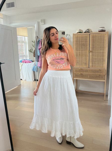 My fave spring outfit: cute white maxi skirt + a graphic top. Both from American eagle & sooo comfy! This would be so cute for a concert with cowboy boots. Both true to size, M 

#LTKFindsUnder50 #LTKSeasonal #LTKSaleAlert