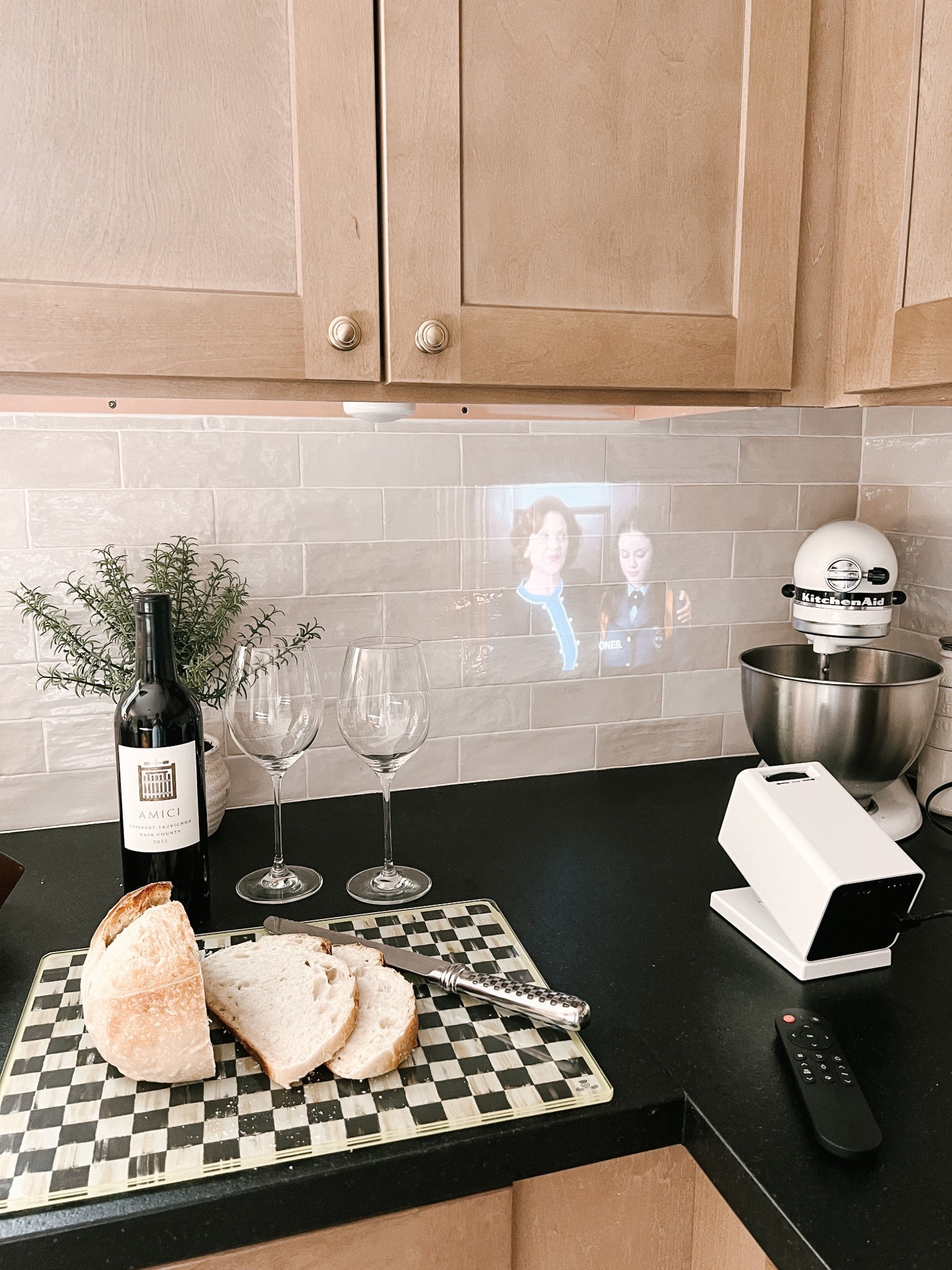 $50 projector I never knew we needed 🙌🏼 we use this all around the house but my fave is in the kitchen. Bringing my 90’s childhood back to life 

#LTKStyleTip #LTKHome #LTKFindsUnder50