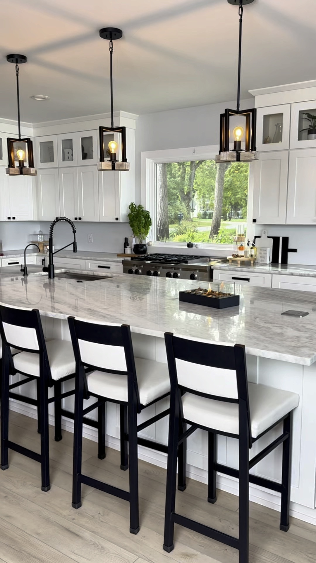 Here are 5 of my favorite kitchen items I wish I’d gotten sooner. From mess-free sweeping without a dustpan to the sleek look of a Firepit in the kitchen. I love these modern glasses, and the sliding tray makes pulling out my espresso machine and stand mixer so easy. Plus, the knives add both quality and style to my kitchen decor.

#LTKHome #LTKVideo