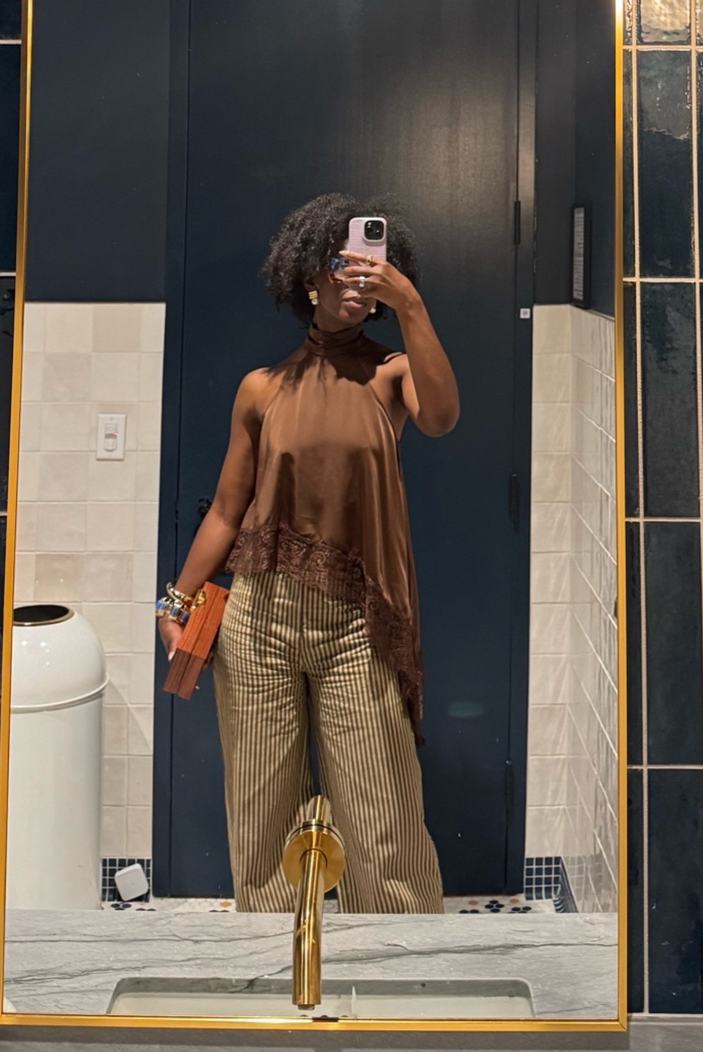 I am so obsessed with these pants. The contrast cuff is insane and the material is mostly cotton! Ordered size S in both pieces. 

Summer outfit halter top outfit brown halter outfit striped pants outfit cotton pants outfit asymmetrical hem  Karrica Ruahh jewelry fashion nova pant

#LTKTall #LTKootd