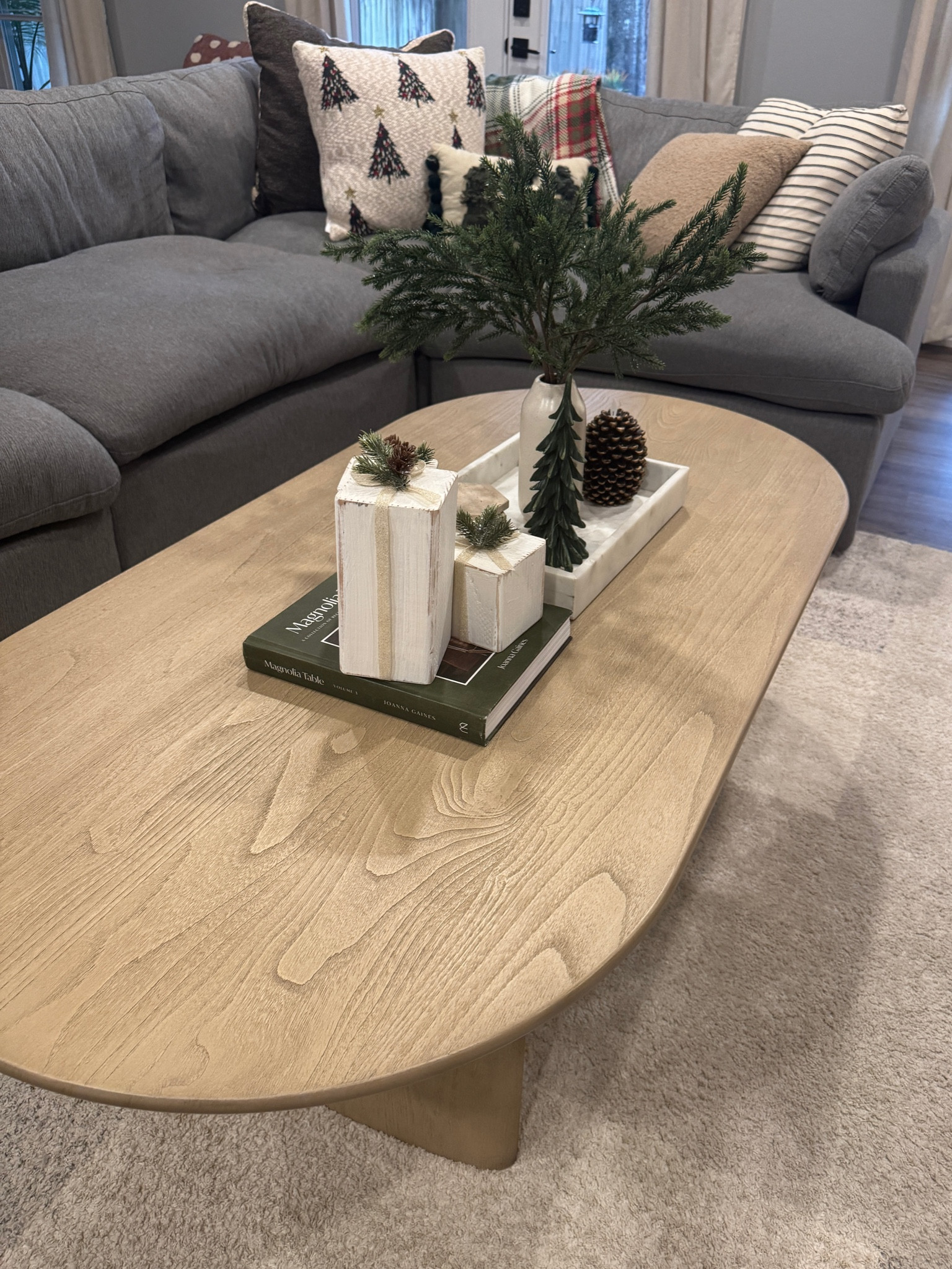 Holiday coffee table Inspo🤎 this table is perfect for families who have young kids because of the curved edges and large tabletop!! #LTKHoliday 

#LTKStyleTip #LTKSeasonal
