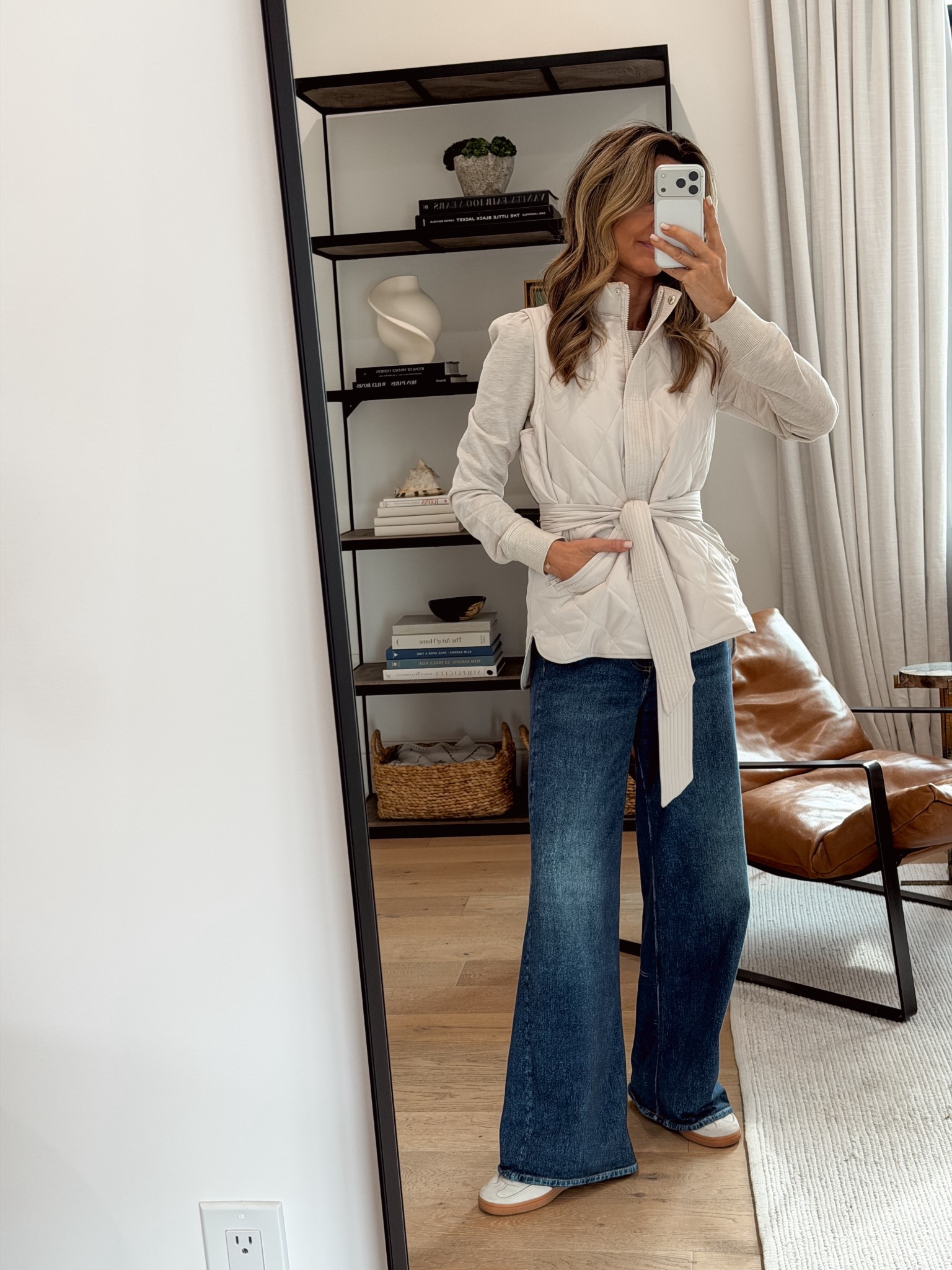 -Vital sweatpant jeans XS. I’m 5’6”
- Cozy quilted vest sz XS. Waist tie is removable. 
- Thicker, puff sleeve top sz XS 
- Flats TTS & worth the hype! 

#LTKTravel #LTKOver40 #LTKootd