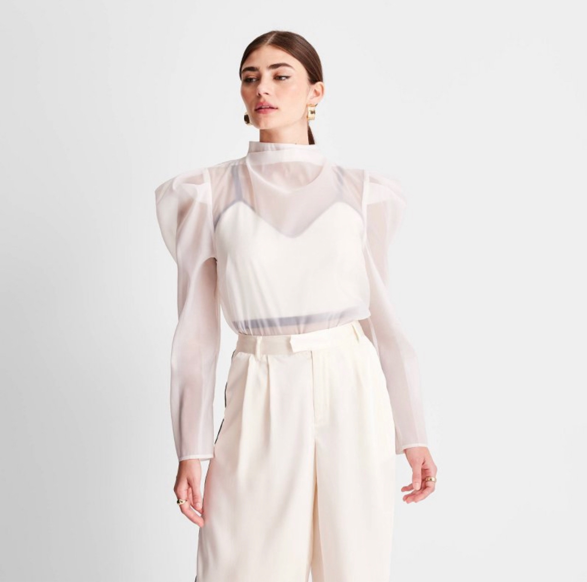 Puff shoulder mock neck blouse from Target on sale for $19 for cyber week!

#LTKunder50 #LTKCyberweek #LTKsalealert