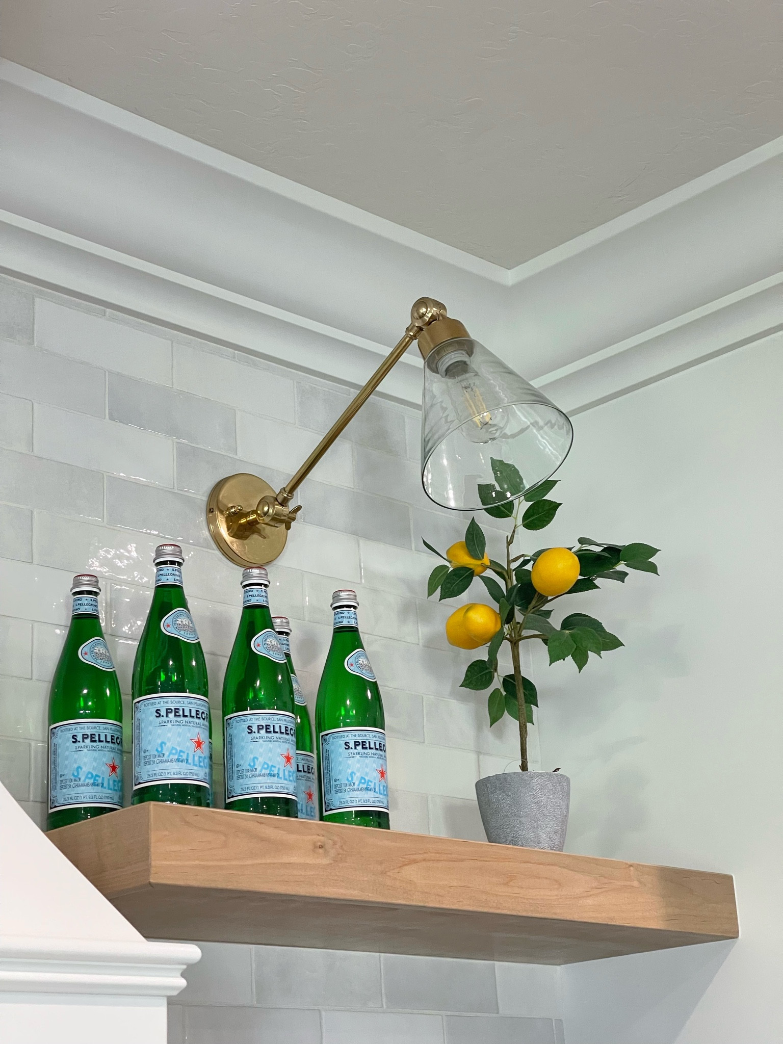 We love these beautiful sconce lights above our open shelves. Available with glass or brass shade.

#LTKhome