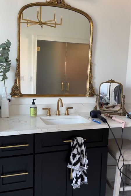 Renovations are hard but designing a space you love is worth it. Two of these large primrose mirrors with the vanity mirror in between completed this space 

#LTKhome