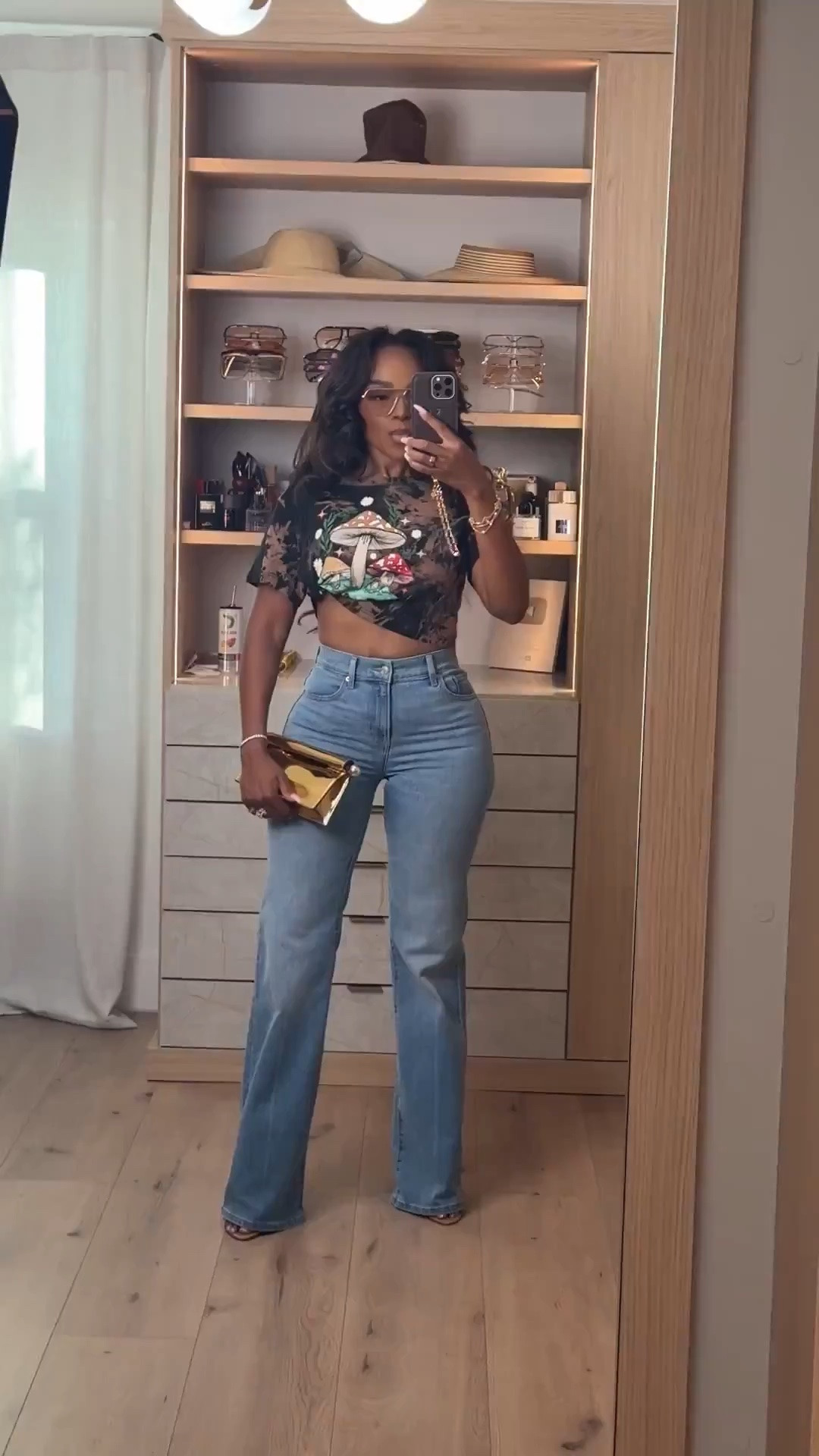 Hi Babes! ✨

Okay this graphic tee and denim combo is the perfect example of making casual basics feel elevated with the right styling. The fitted vintage-inspired tee paired with these flattering light wash jeans gives such an effortless cool-girl vibe while still looking polished and put together.

Adding the gold clutch and layered jewelry instantly takes this from everyday casual to that luxe off-duty aesthetic. This is the kind of outfit you’ll wear on repeat because every piece works with so many other staples too.

Where to wear this:
• Casual lunch dates
• Coffee runs + errands
• Weekend shopping days
• Travel outfits
• Everyday elevated casual looks

Luxury accent: styled with a metallic luxe-inspired clutch and layered gold accessories for that polished high-low mix.

Undergarments: seamless nude undergarments recommended with these jeans.

Everything is linked below ✨

xx Kira | IG: KirasFashionFinds

5’4 | 140LBS | 34D-27-40 | Size Small or 4

Graphic tee outfit, light wash denim outfit, elevated casual style, effortless everyday fashion, cool girl summer outfit, luxury inspired casual look, wide leg jeans outfit, chic denim styling, casual street style women, trendy summer basics, off duty model aesthetic, casual luxe fashion

Follow me on Instagram and YouTube @kirasfashionfinds

#LTKootd #LTKgrwm #LTKPetite