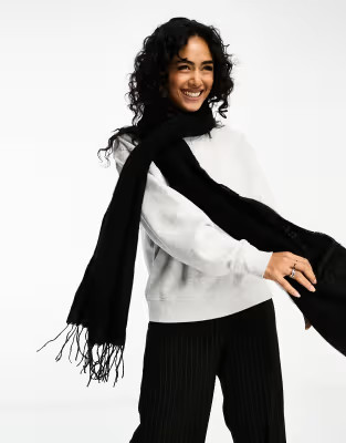 ASOS DESIGN supersoft scarf with tassels in black | ASOS (Global)