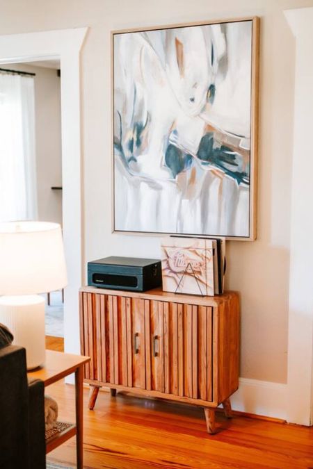 This is the perfect wall decor setup for your living room! 

Shop now!

living room, painting, chest, record player, record stand, modern aesthetic

#LTKSale #LTKhome