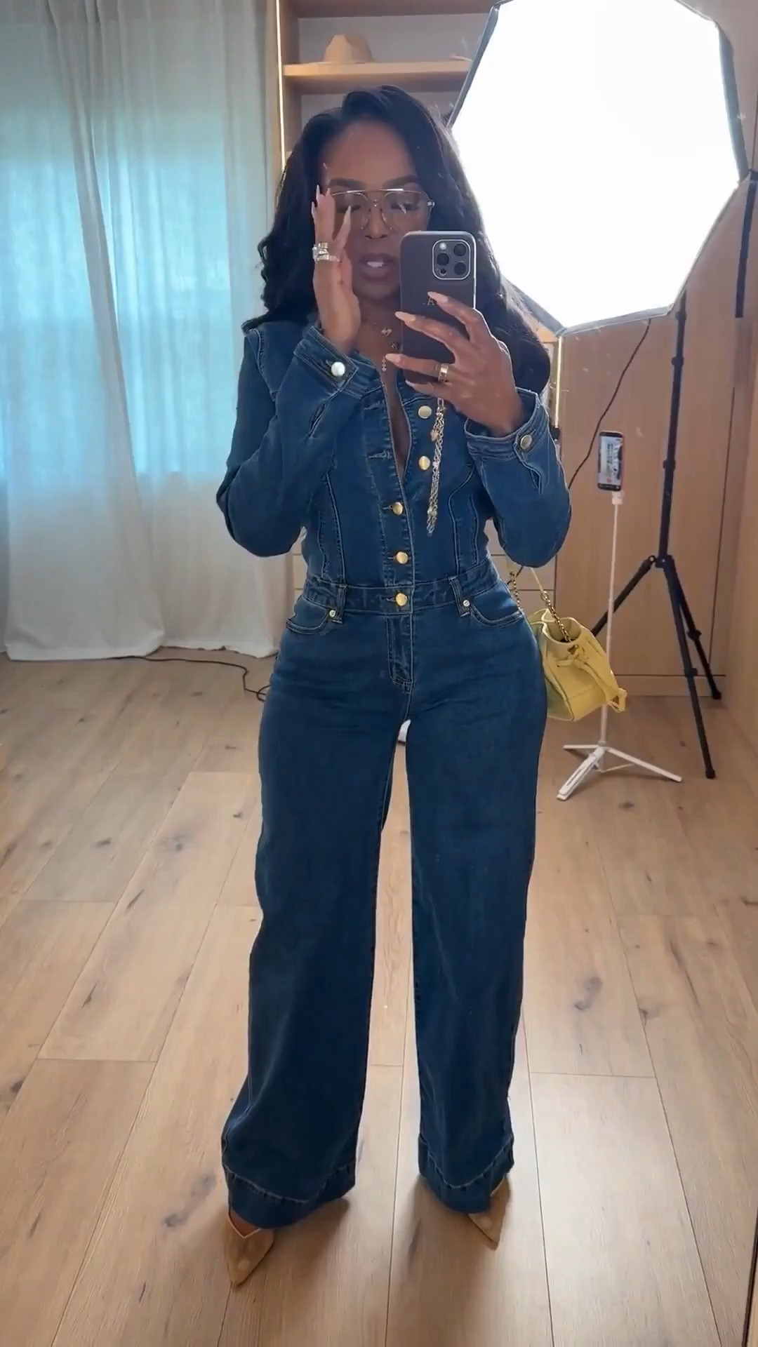 Hi Babes!

Okay this denim jumpsuit is EVERYTHING 💙

The structured fit snatches the waist, the wide-leg silhouette makes your legs look miles long, and the gold buttons give it that expensive designer-inspired feel. I love that it’s a complete outfit all on its own—just add a heel and a cute bag and you're done.

Where to wear this:
• Girls' night out
• Date night
• Concerts
• Brunch with the girls
• Casual Friday at the office

The dark wash makes it look so elevated, and the fit is incredibly flattering on a curvy petite frame.

Undergarments: Nubra or fashion tape recommended for the deep neckline.

Everything is linked below

xx Kira | IG: KirasFashionFinds

34D - 27 - 40 • Size Small or 4