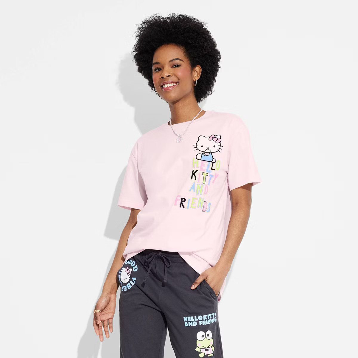 Women's Sanrio Positivity Oversized Short Sleeve Graphic T-Shirt - Pink L | Target