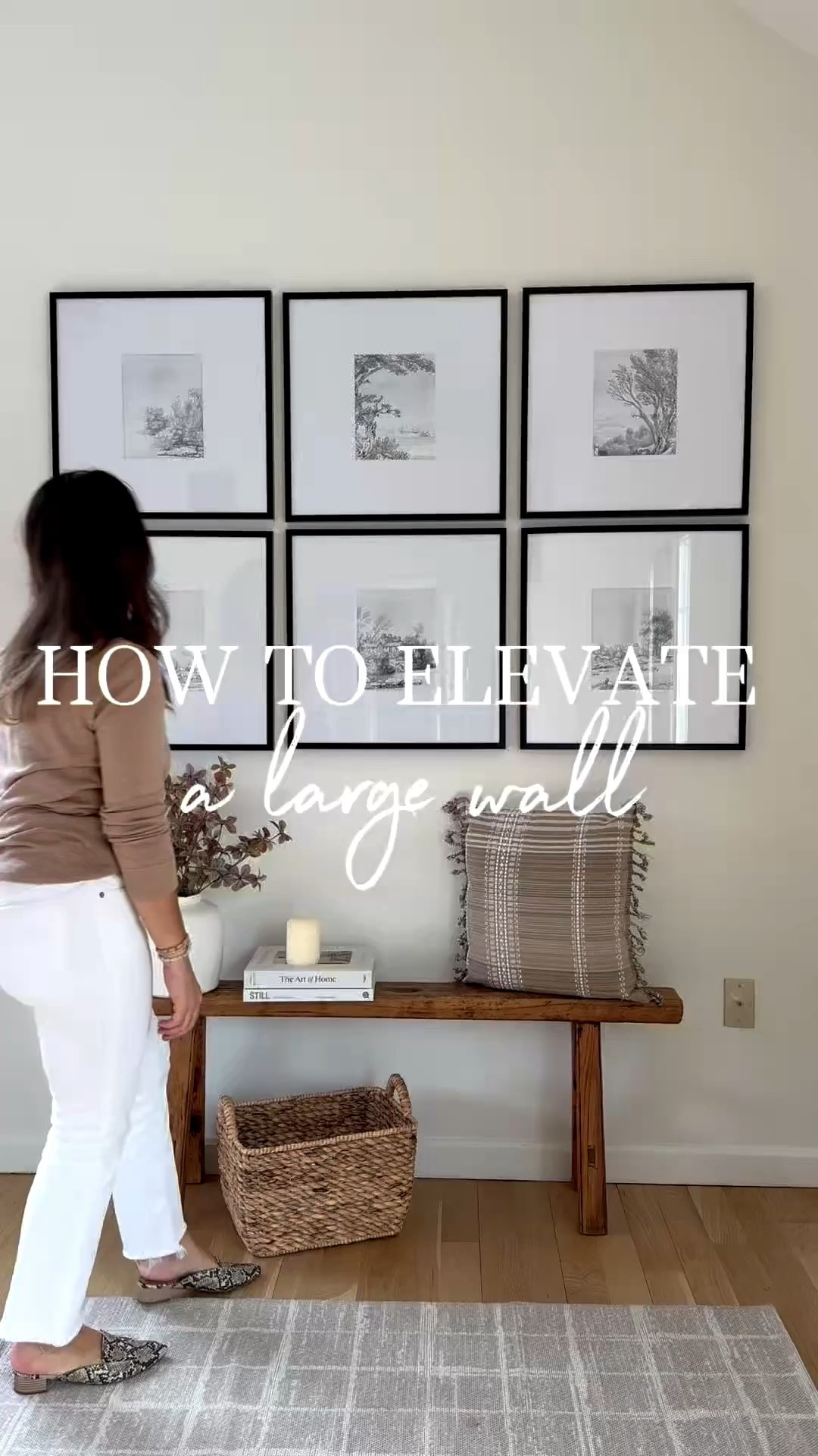 One way to elevate, a blank wall is to use large with art that you love in place something under it like a wood bench, console table, Ottomans, or sofa. Add some decor pieces on top and a woven basket to add some texture and done.

#LTKHome