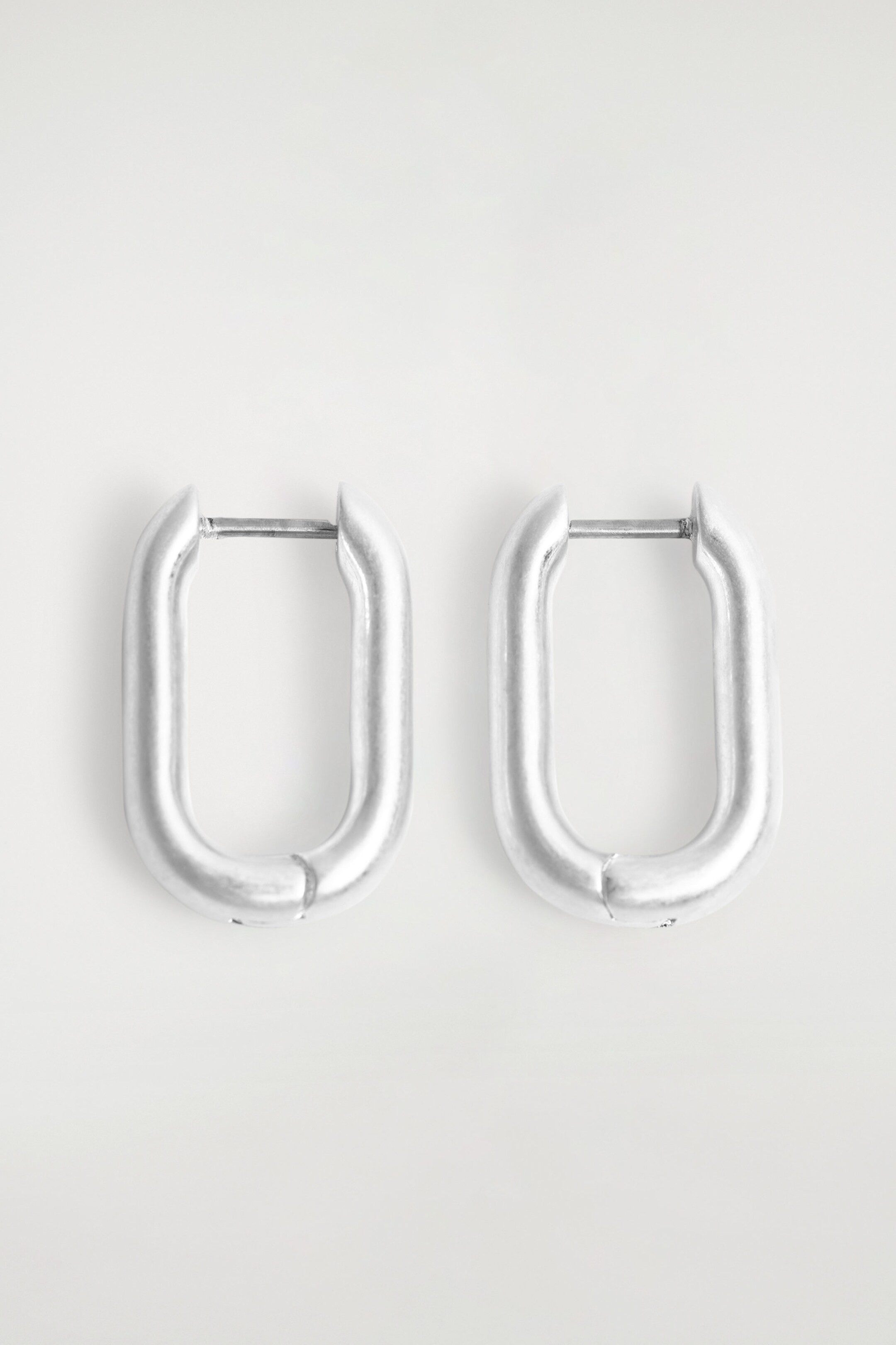 OVAL HOOP EARRINGS - SILVER | COS UK