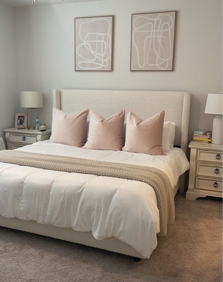 My apartment bedroom ✨ Beige upholstered king bed from Wayfair - White duvet and cover from pottery barn - pink pillow covers and feather filled pillow - Casaluna chunky knit throw 

#LTKfamily #LTKsalealert #LTKhome