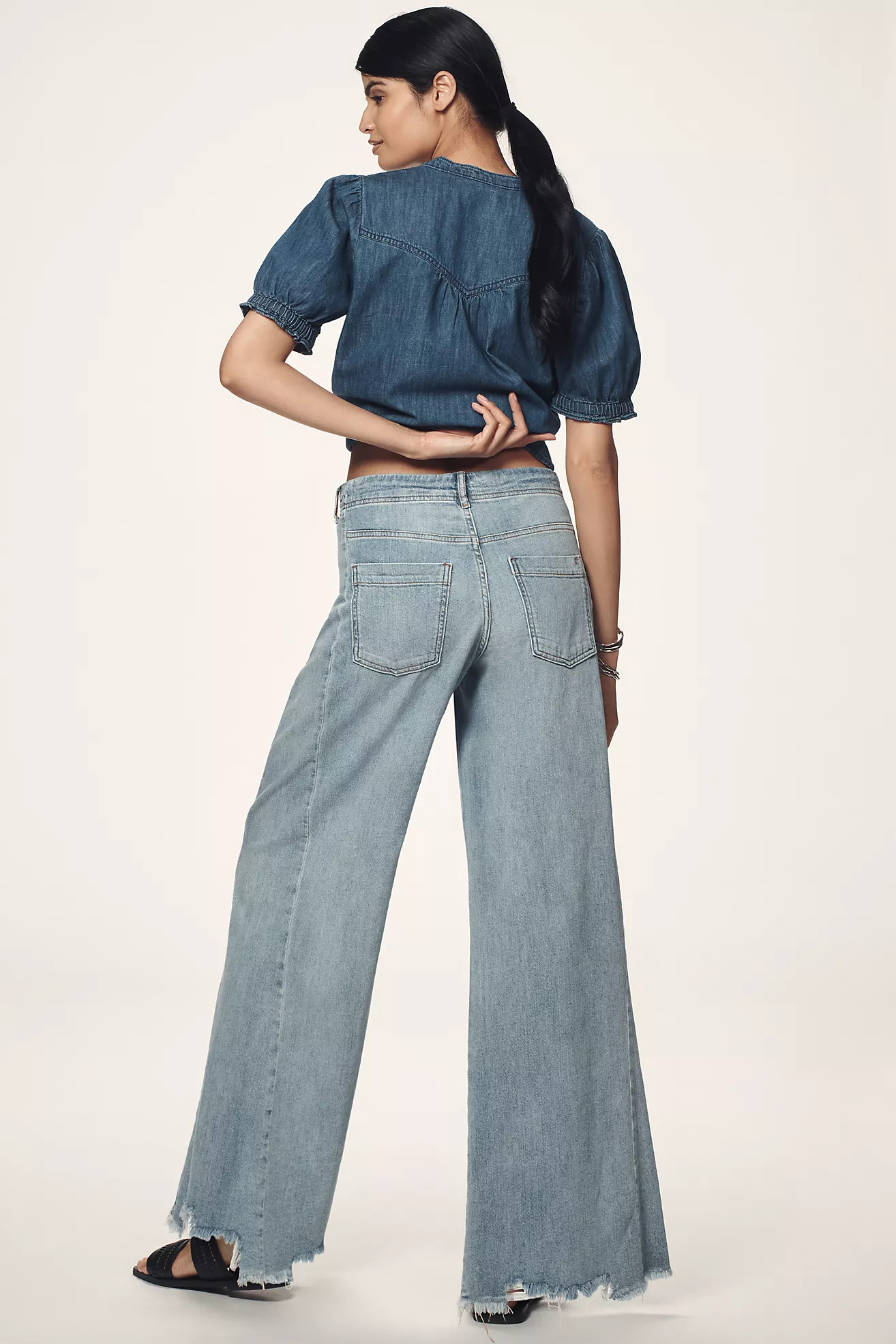 The Adi Regenerative Cotton Mid-Rise Flare Jeans by Pilcro | Anthropologie (US)
