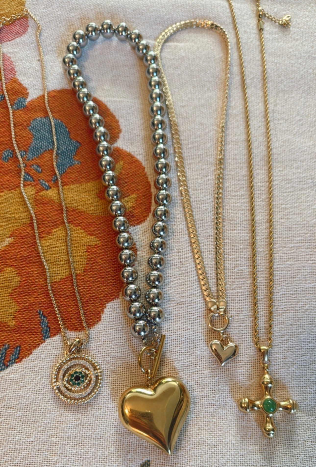 Fun inexpensive statement jewelry | necklaces | gold 

#LTKFindsUnder50 #LTKWedding #LTKStyleTip