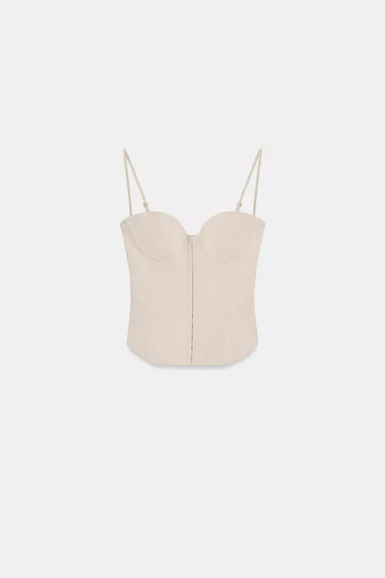 Fitted top with a sweetheart neckline. Featuring thin adjustable straps and a matching inner lini... | Zara UK