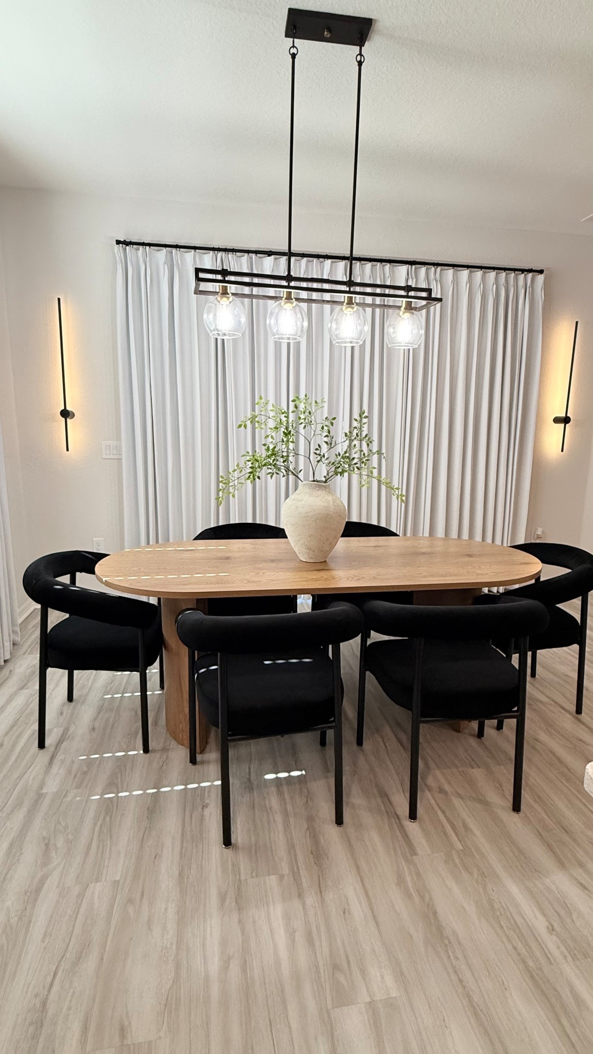 Dwen & New York 79" Oval Dining Table Set for 6 (7-Piece)
Black chairs, they have colors to choose from 


Dining set
Modern dining table and 6 chairs 


#LTKSeasonal #LTKSaleAlert #LTKHome