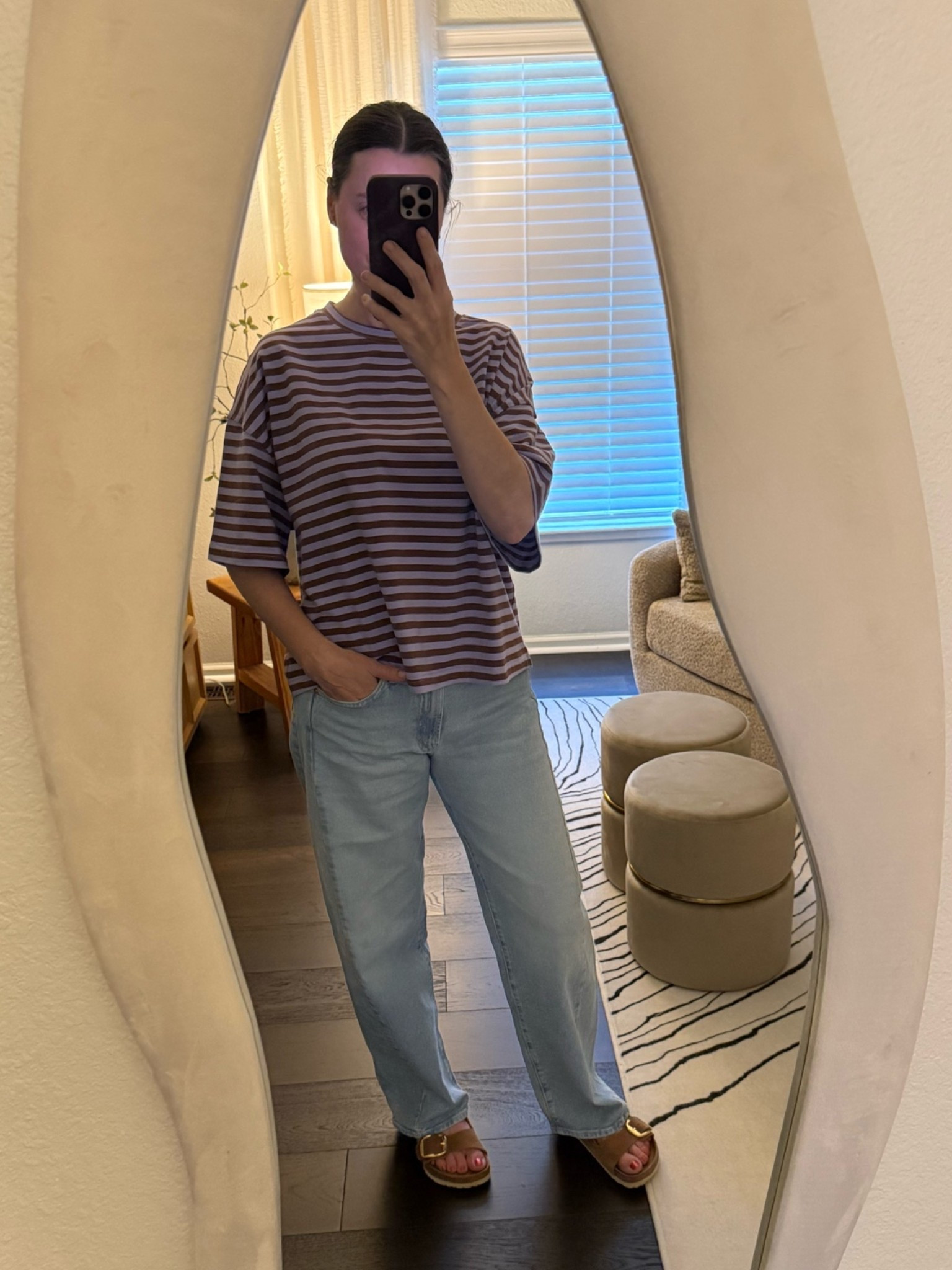 These jeans are some of the comfiest I have ever owned. I love the loose fit of them. I purchased 1 size bigger for an oversized look. I am wearing a 26 but my 25 fit great!  I paired it with this oversized boxy tee for a comfy day fit. These sandals were the perfect way to tie it all together!

#LTKootd #LTKvlog