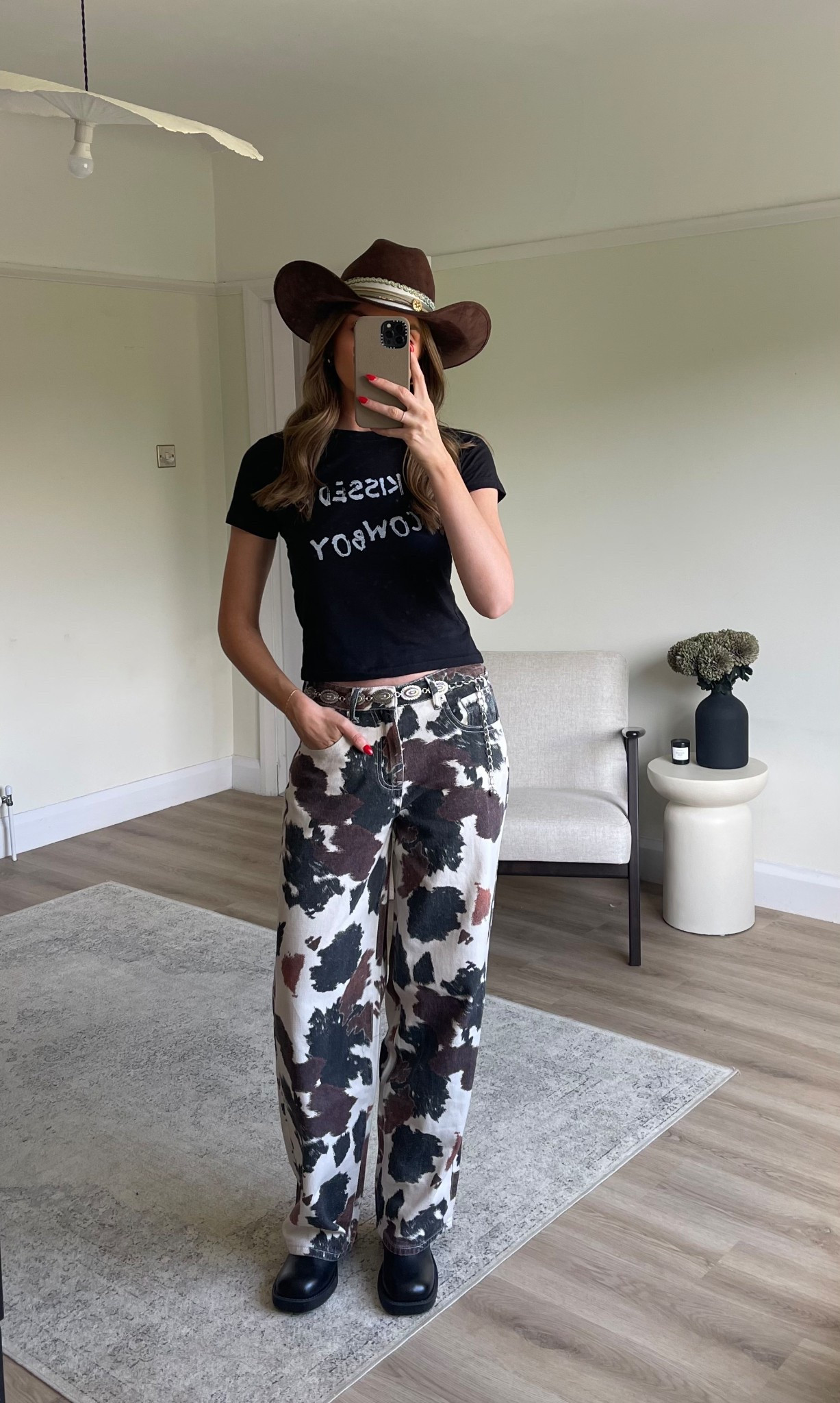 Beyoncé’s cowboy Carter tour outfit inspiration 
Size 8 in the black baby tee
Size 8 in the cow print jeans 
Black flat cowboy boots Brown
Brown cowboy hat 

#LTKsummer