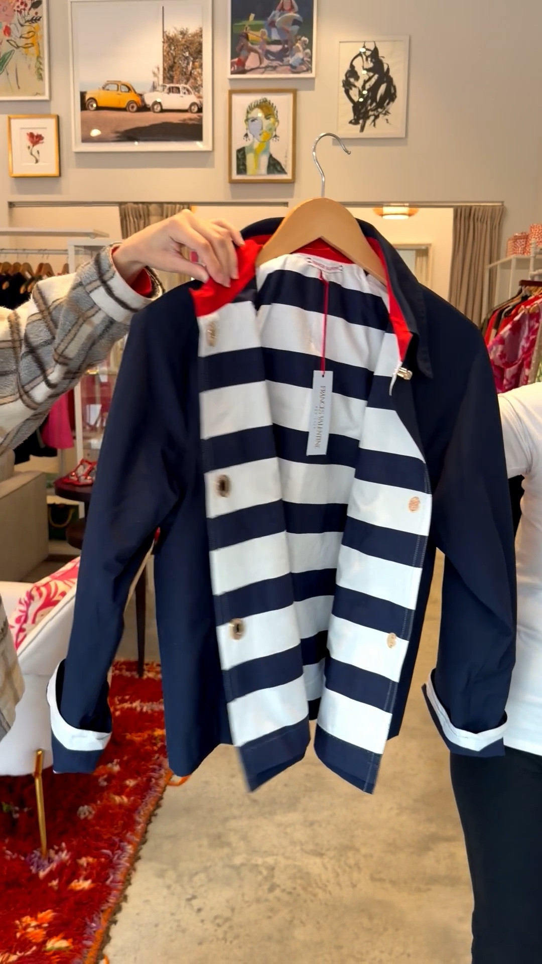 Timeless navy trench coat designed with classic tailoring and refined details. The front is adorned with gleaming gold buttons and finished with crisp white cuffs for a polished, sophisticated look. Inside, the coat is lined with navy stripes and accented with a subtle red detail at the collar, adding a touch of unexpected elegance.
Rain jacket, spring jacket


#LTKTravel #LTKSeasonal #LTKOver40