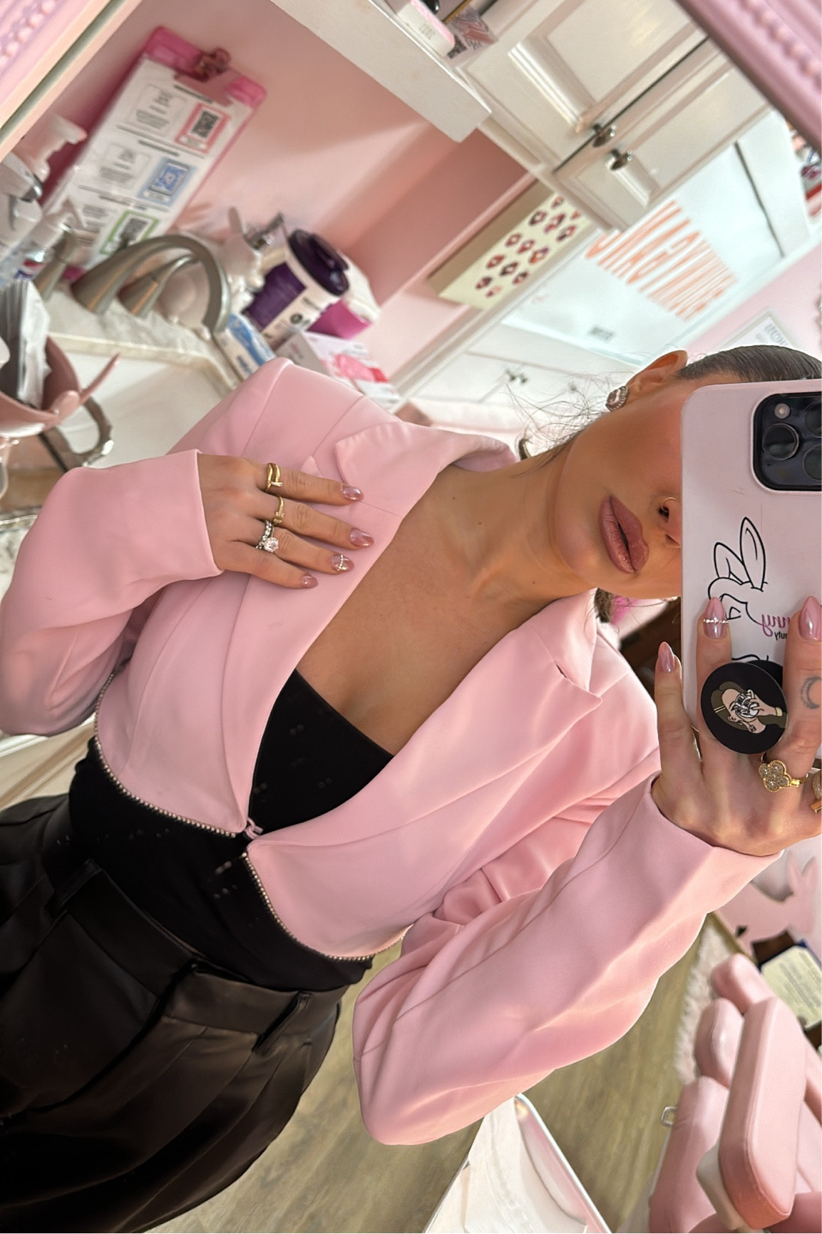 Wearing XXS pink cropped blazer lined with rhinestones for a little extra sparkle! Paired with wide leg, leather pants. Perfect for a night out or a day in the office 🩷

#LTKSpringSale #LTKU #LTKparties