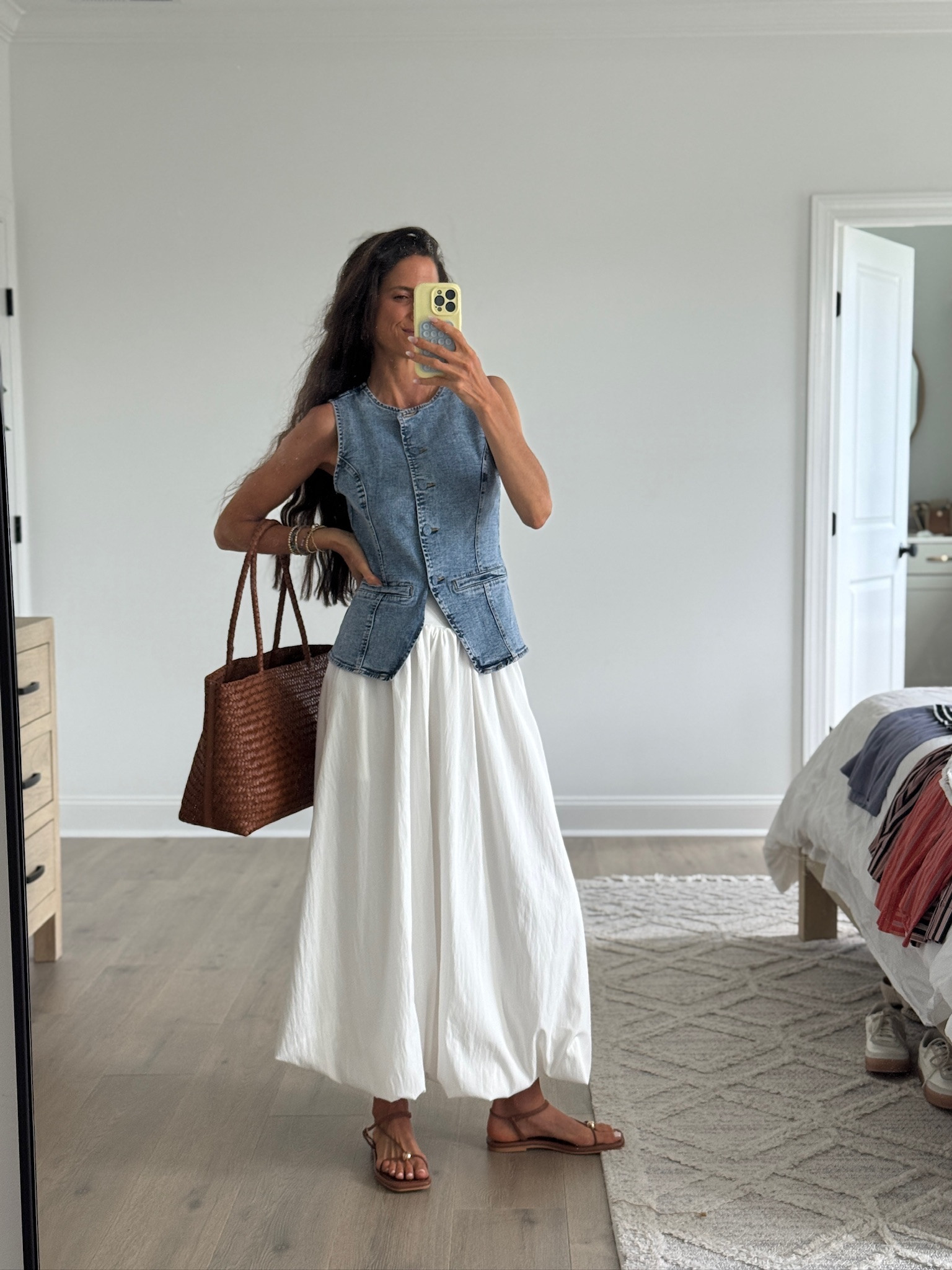 If I could only pack one skirt for a vacation, it would be a white midi. It instantly makes every outfit feel fresh, polished, and put together while working with almost everything already in your closet.

#LTKSeasonal #LTKmomlife #LTKgrwm