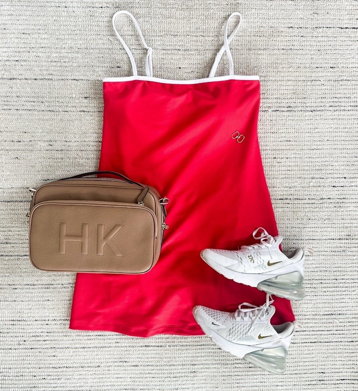 Red athletic dress that is perfect for summertime and the 4th of July! Can be styled with sneakers or sandals for a chic look. Great for traveling, too

#LTKSeasonal #LTKootd