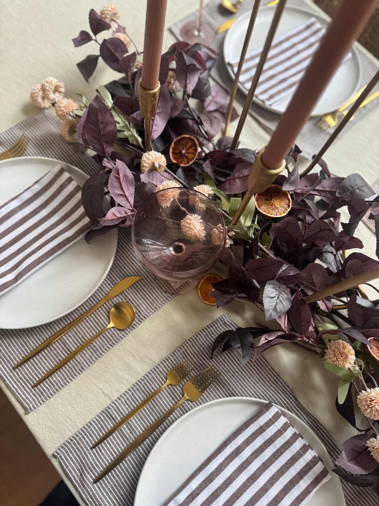 This romantic Thanksgiving table setup is giving pretty, organic charm. Combining rich textures, deep plum, and blush? Yes please. 

#LTKHoliday #LTKSeasonal #LTKHome