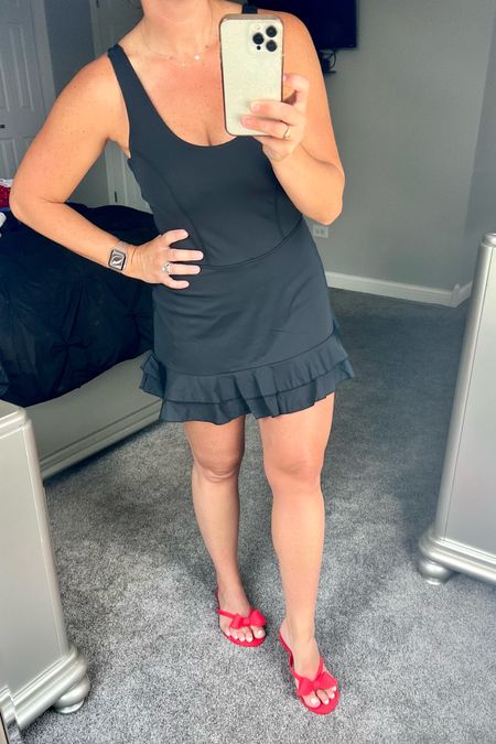This size is out of stock so make sure you click to get notified when it’s back in stock. 
Athletic dress. Athletic dress with pockets. Ruffle dress. Ruffle athletic dress. Red sandals. Bow sandals. Target dress. Target athletic dress. Amazon bow sandals. Red bow sandals. Casual. Casual dress. Running errands dress. 

#LTKstyletip #LTKshoecrush #LTKFind