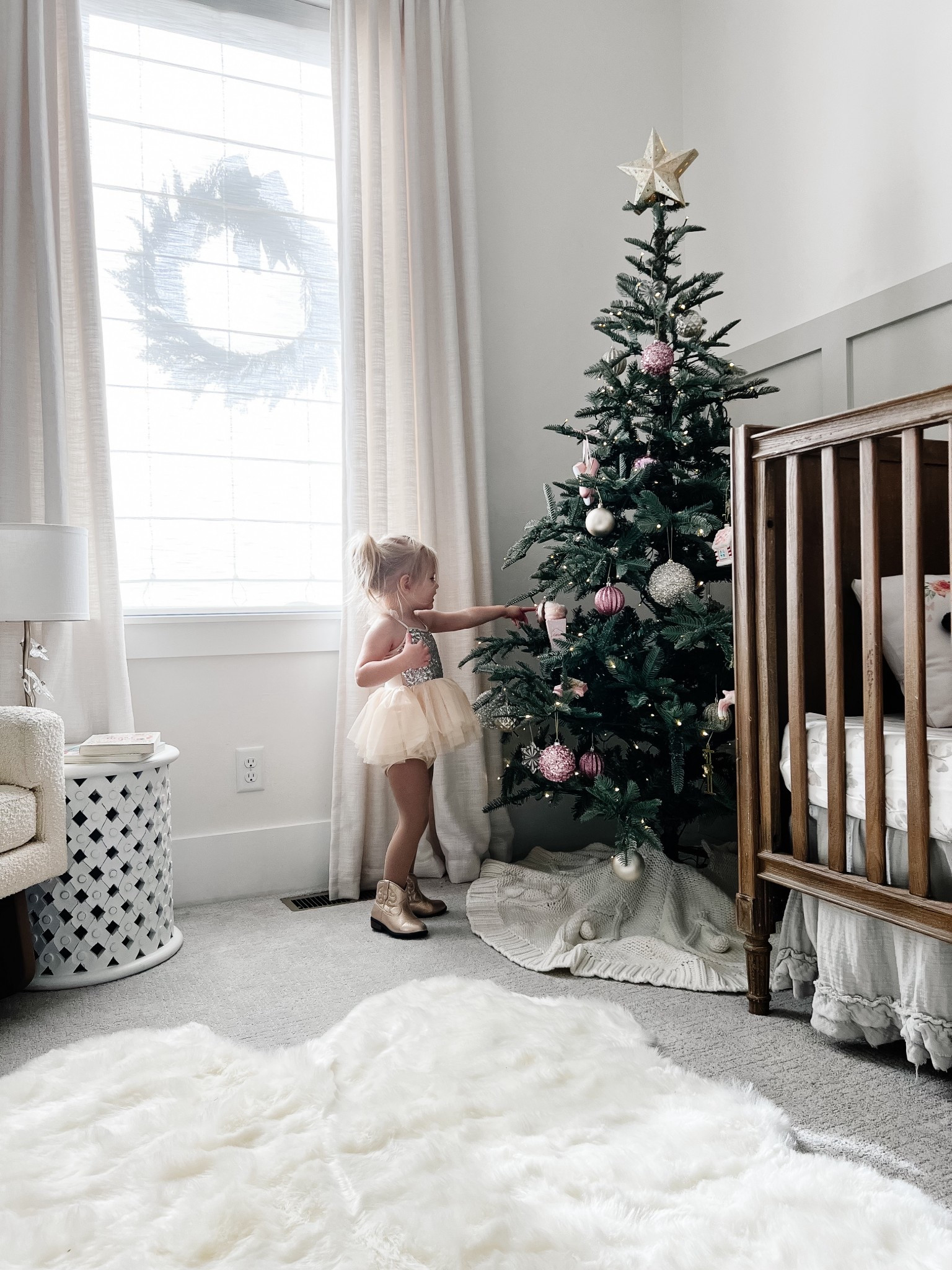 Holiday nursery magic 🤍🎄
Between the classic wood crib, twinkling Christmas tree, soft faux fur rug, and dreamy chandelier… this space feels straight out of a storybook. Timeless, cozy, and full of heart.

Every piece is linked so you can recreate this exact nursery look—tap to shop 🛍️

#NurseryInspo #NeutralNursery #BabyRoomDecor #ClassicNursery #NurseryDesign #TimelessHome #ShopMyNursery #LTKHome #CozyInteriors #GenderNeutralNursery #InteriorInspo #BabyRoomGoals

#LTKHoliday