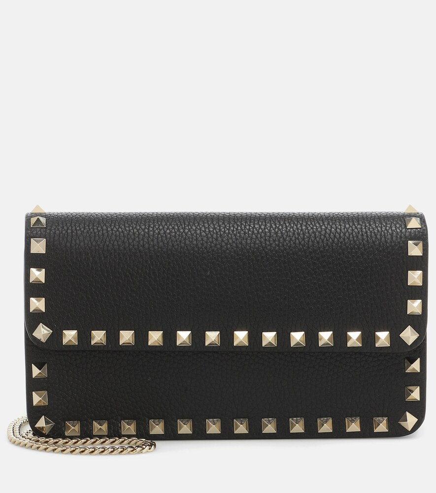 Valentino Garavani Rockstud leather clutch | Mytheresa (US/CA)