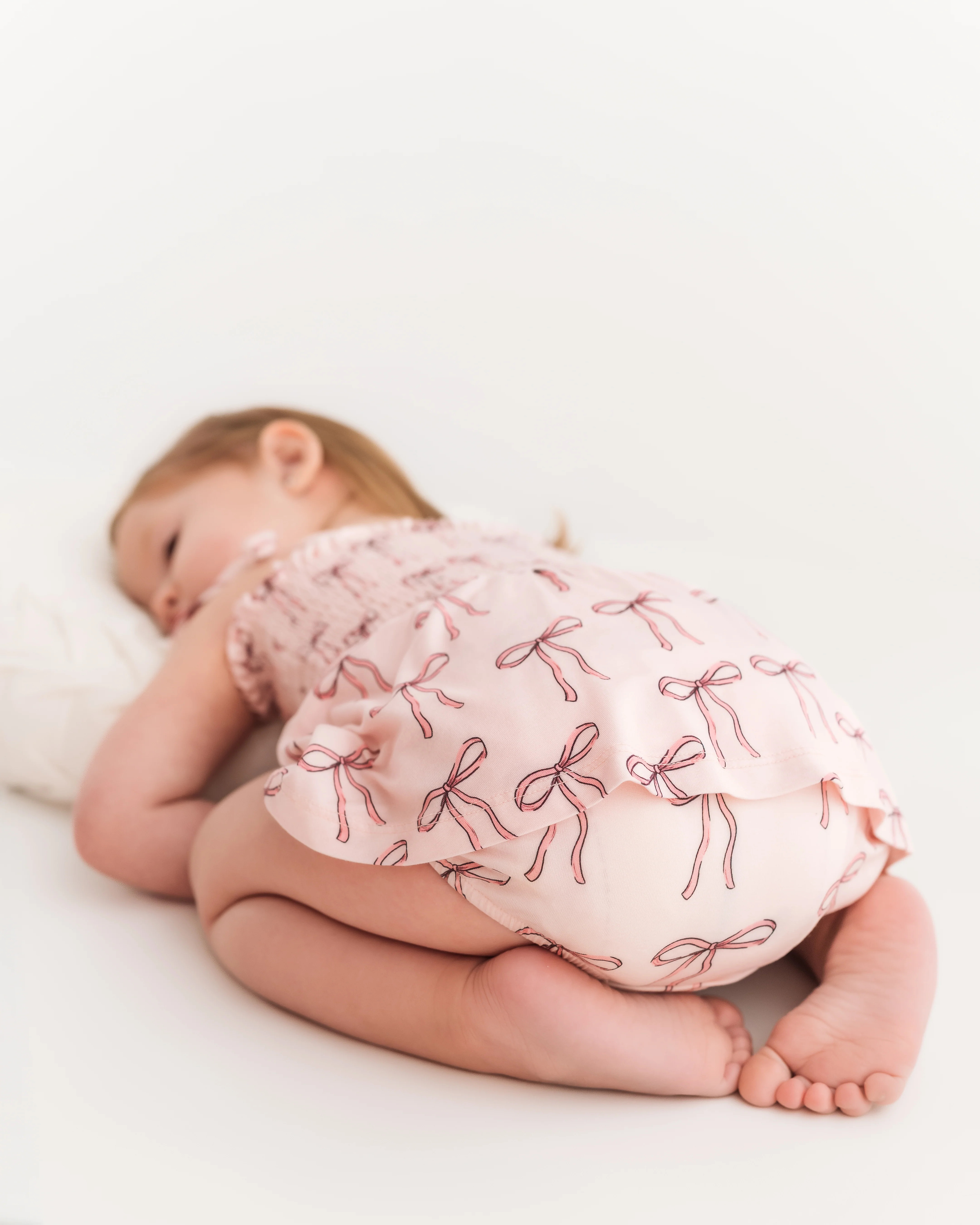 Pink Bow Smocked Twirl Romper | In My Jammers