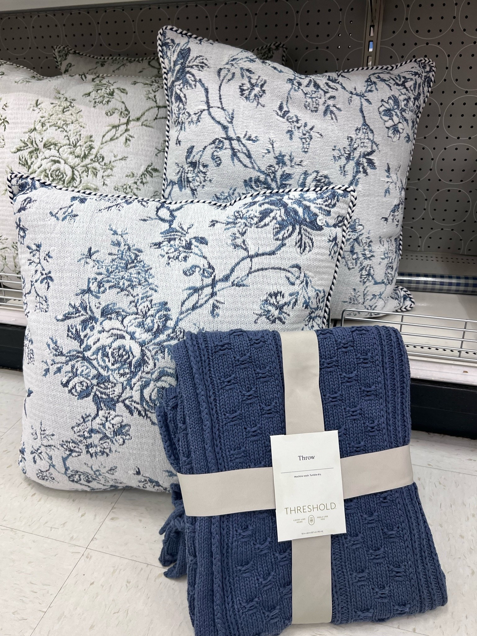 These throw pillows and throw blanket, from Target, are the prettiest blue and look so rich!

#LTKHome