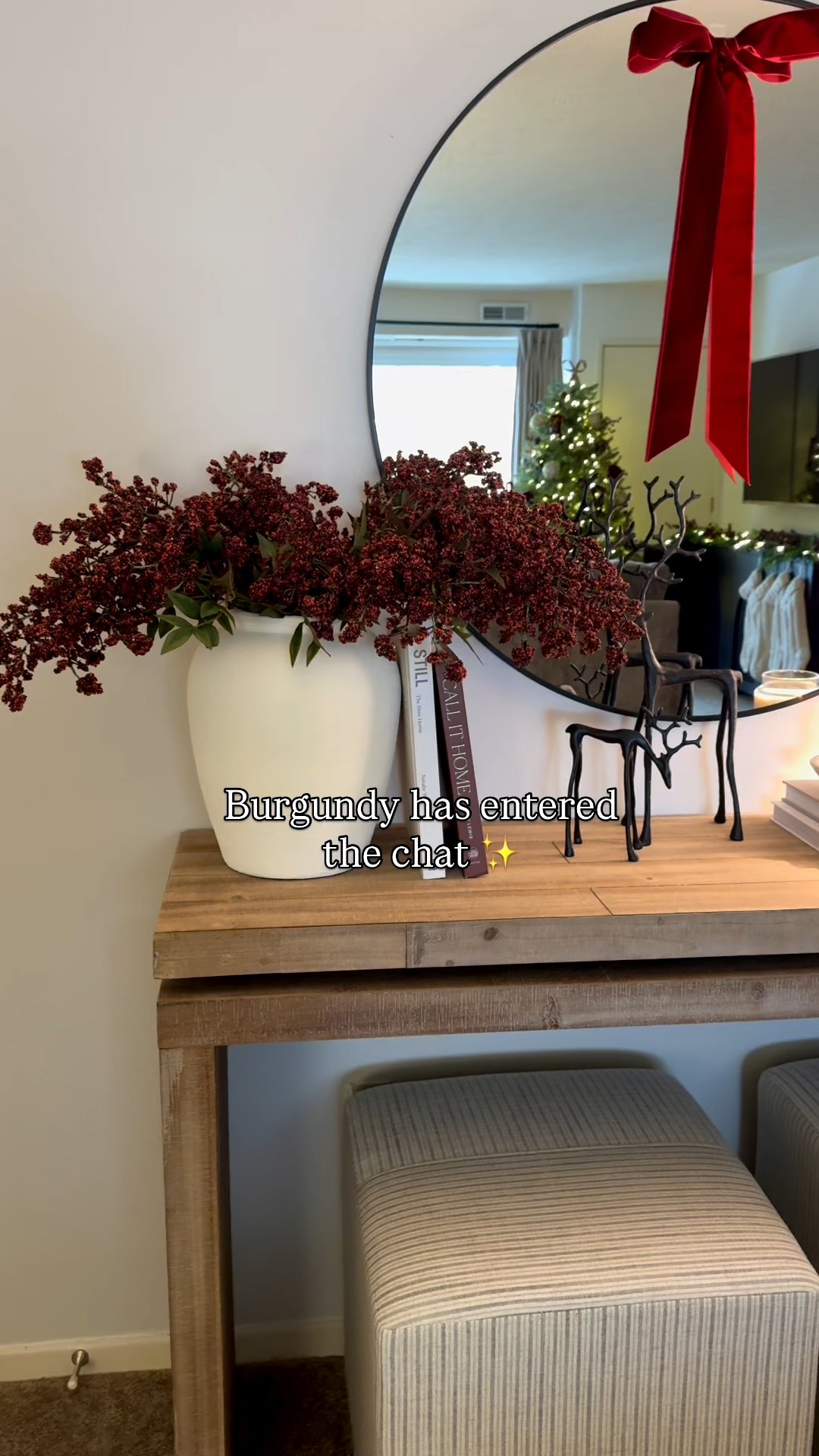 Winter console, Christmas console, console table, wayfair console, arwah console table, burgundy berry stems, nardina stems, berry stems, Afloral stems, pottery barn reindeer, wood console, stripe ottomans, burgundy ribbon, burgundy velvet, coffee table books, round mirror, white vase, candle bowl

#LTKHoliday #LTKSaleAlert #LTKSeasonal