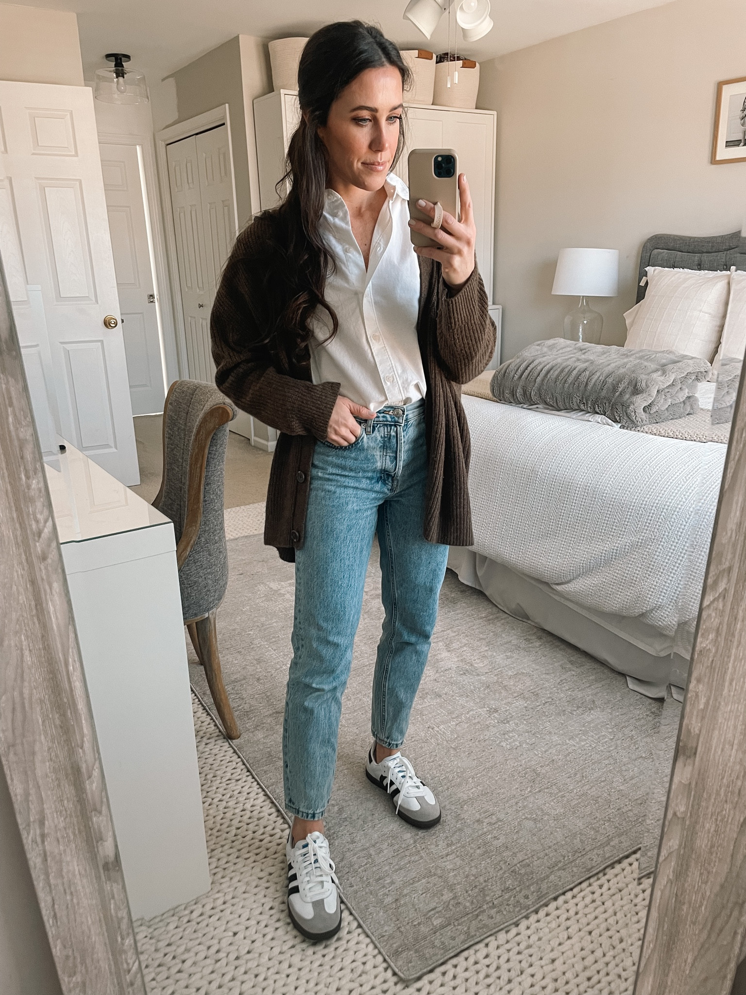 3.14.23
Quince Cashmere Cardigan, white button up, Everlane jeans, samba sneakers 

#LTKFind #LTKstyletip