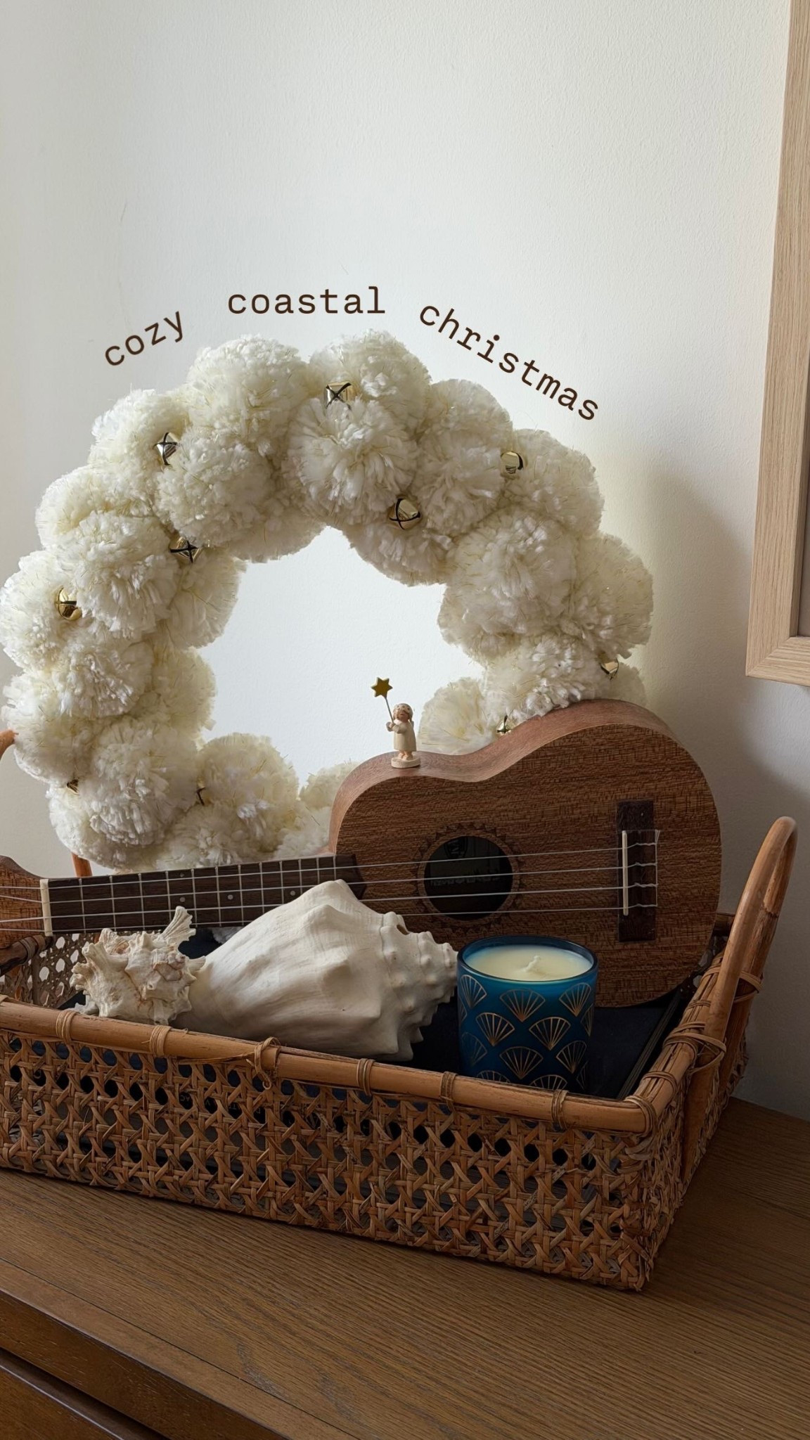 cozy coastal christmas decor — linked the larger candle & similar pom pom wreaths! Mine is older from target, xx. 

#LTKFindsUnder100 #LTKHoliday #LTKHome