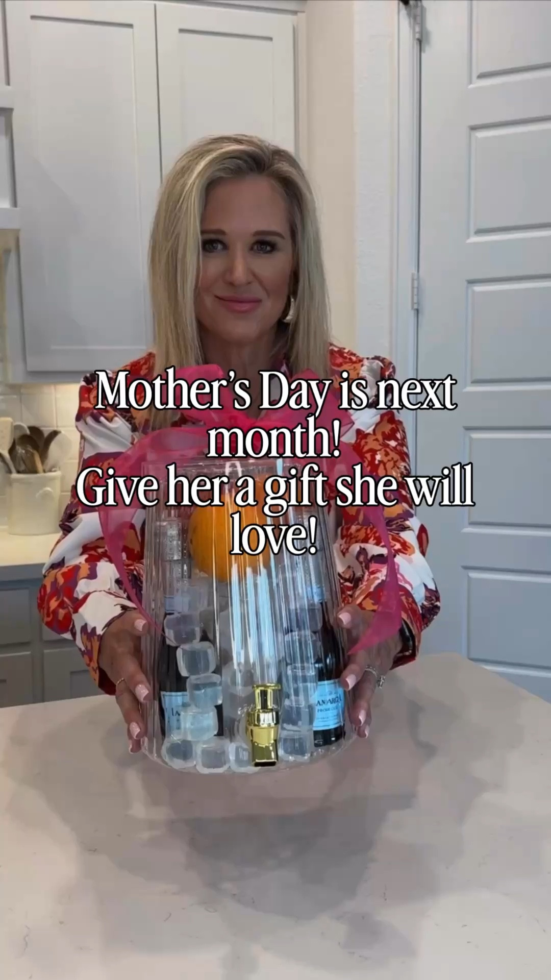 If you want something that feels thoughtful, beautiful, and a little extra—this is it. I filled a drink dispenser with reusable ice, mini bottles of Prosecco, and orange juice for the sweetest little mimosa setup.
Add a few glasses, fresh oranges, and tie it all together with a bow… and you have a gift she’ll not only love, but actually use and enjoy.

#LTKHome #LTKmomlife