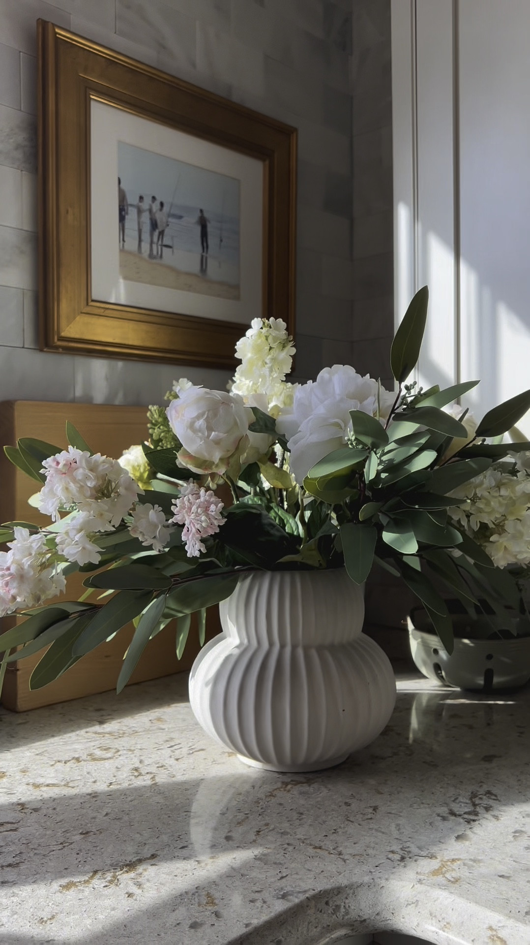 In this vase, there are 
6 eucalyptus stems from Amazon
3 cream lilac stems - Afloral
2 Blush Lilac Stems - Afloral
5 peony Buds - Afloral
2 full bloom peonies  - Target 

If the target peonies are sold out the peonies I linked from Michael’s are stunning and would make a perfect substitute  