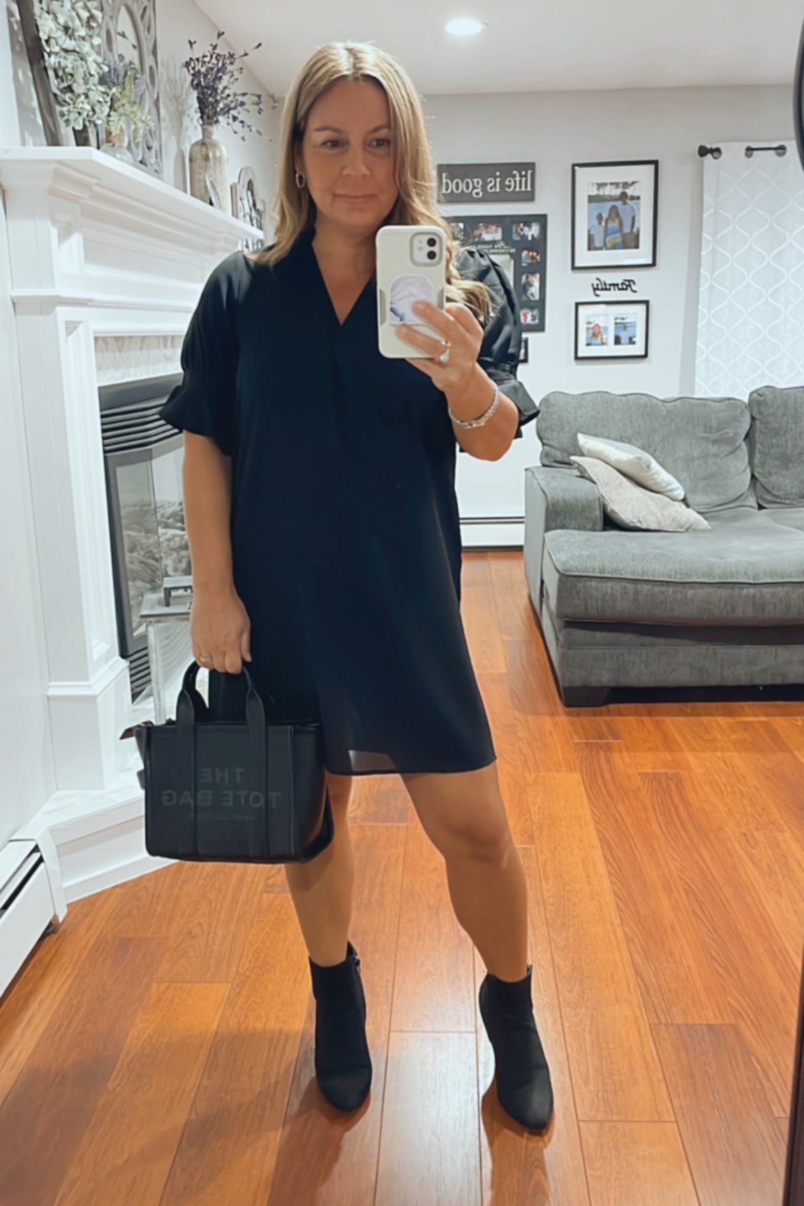 Amazon shirt dress I’m wearing a medium but if you have large bust definitely size up! I love the ruffle sleeve!








Work outfit, fall fashion, fall outfit, midsize style, booties, fall wedding, date night, party event dress, Marc Jacobs The Tote Bag, black dress, fall dress

#LTKcurves #LTKHoliday #LTKunder50
