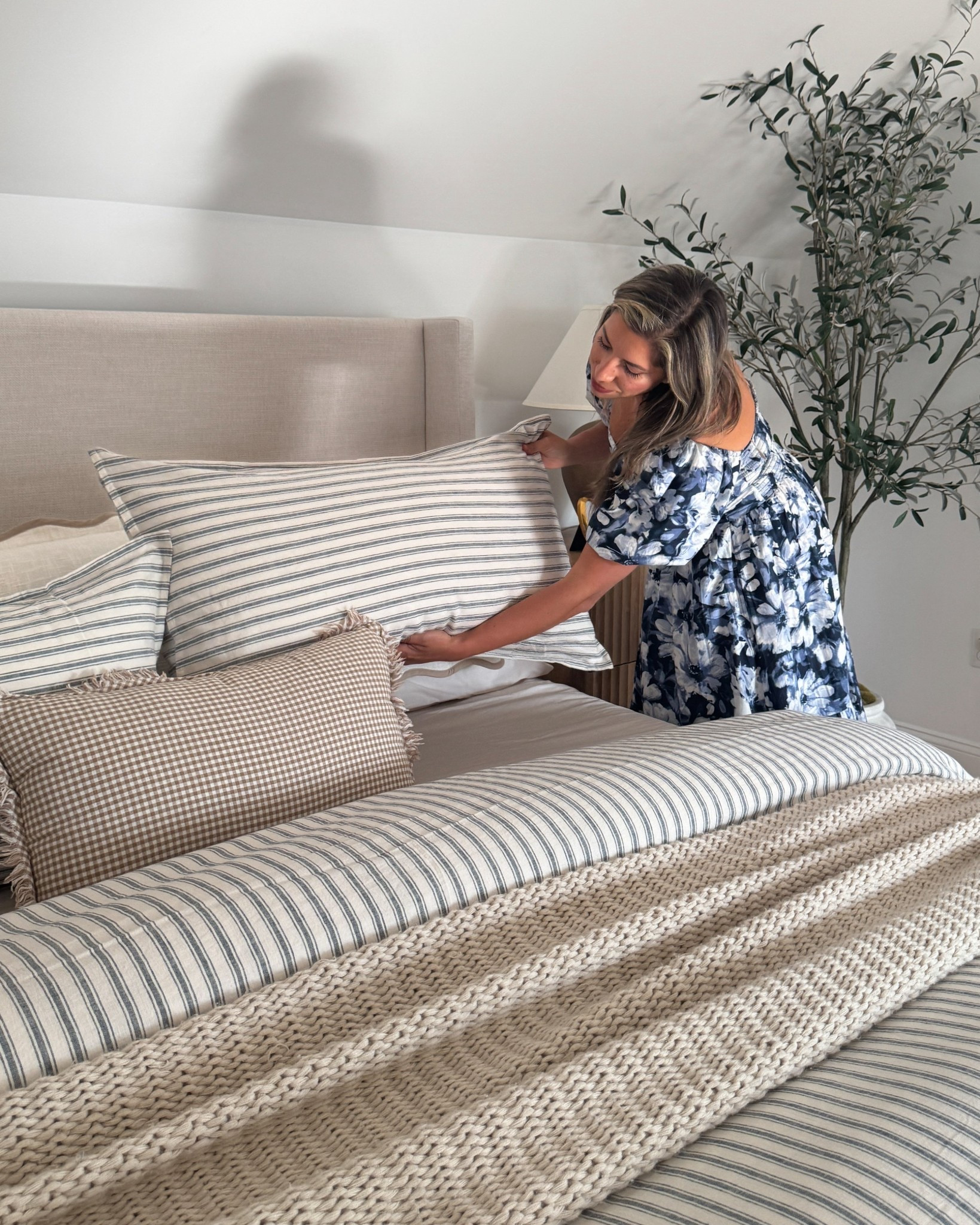 Sunday reset: making the bed with all the cozy layers. These stripes and textures are everything & truly feels like a little sanctuary. 🤍

#LTKStyleTip #LTKHome #LTKFindsUnder100