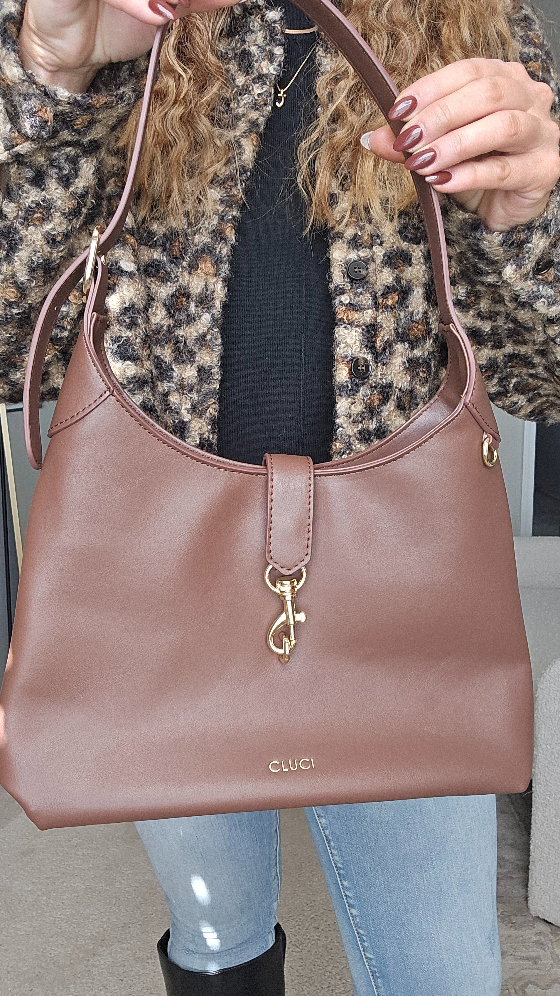 This CLUCI hobo bag with the gold clasp is such a vibe — roomy, soft, and perfect for everyday wear. And yes… it’s up to 35% off right now for Black Friday!#LTKFinds #AmazonStyle

#LTKSaleAlert #LTKCyberWeek #LTKSeasonal