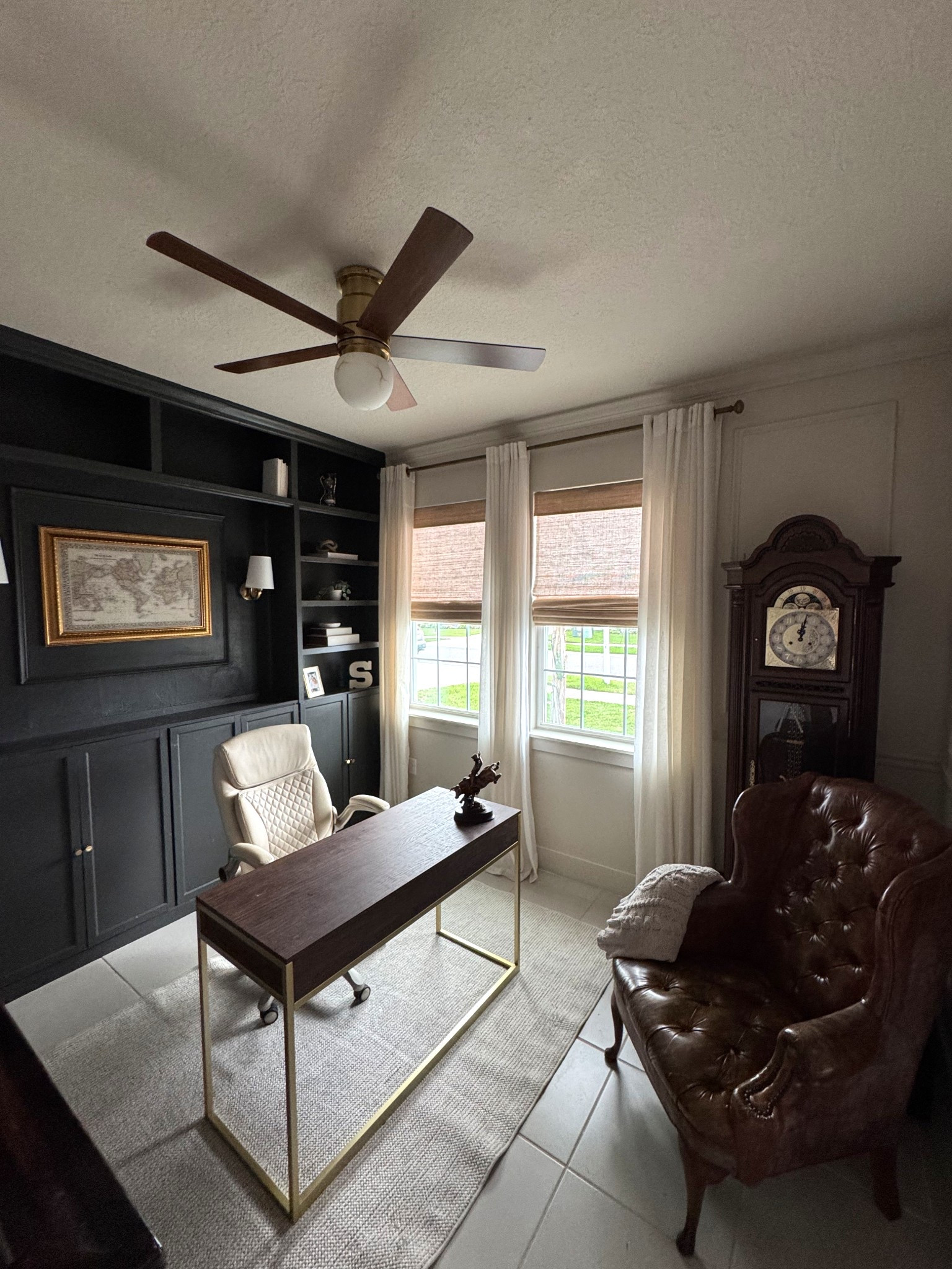 Vintage-inspired office details I’m loving 🤎✨

Bamboo window shades for that warm, natural light
Wood + gold tone fan and desk for a timeless feel
Neutral rug to keep it soft and grounded
Vintage map to pull it all together with character

Cozy, classic, and effortlessly elevated 🤍 #ltkhome #vintageinspired #neutraldecor #homeoffice #cozystyle

#LTKHome