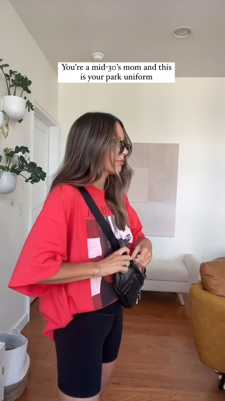 dressed and ready to carry my kids scooters 😉 I could literally live in biker shorts and an oversized tee. details below and everything linked in my summer style highlight!
•
workout set: @aerie 
tee: @daydreamerlaclothing 
sunglasses: @ysl Sulpice
bag: @caraasport 
sneaks: @nike air max