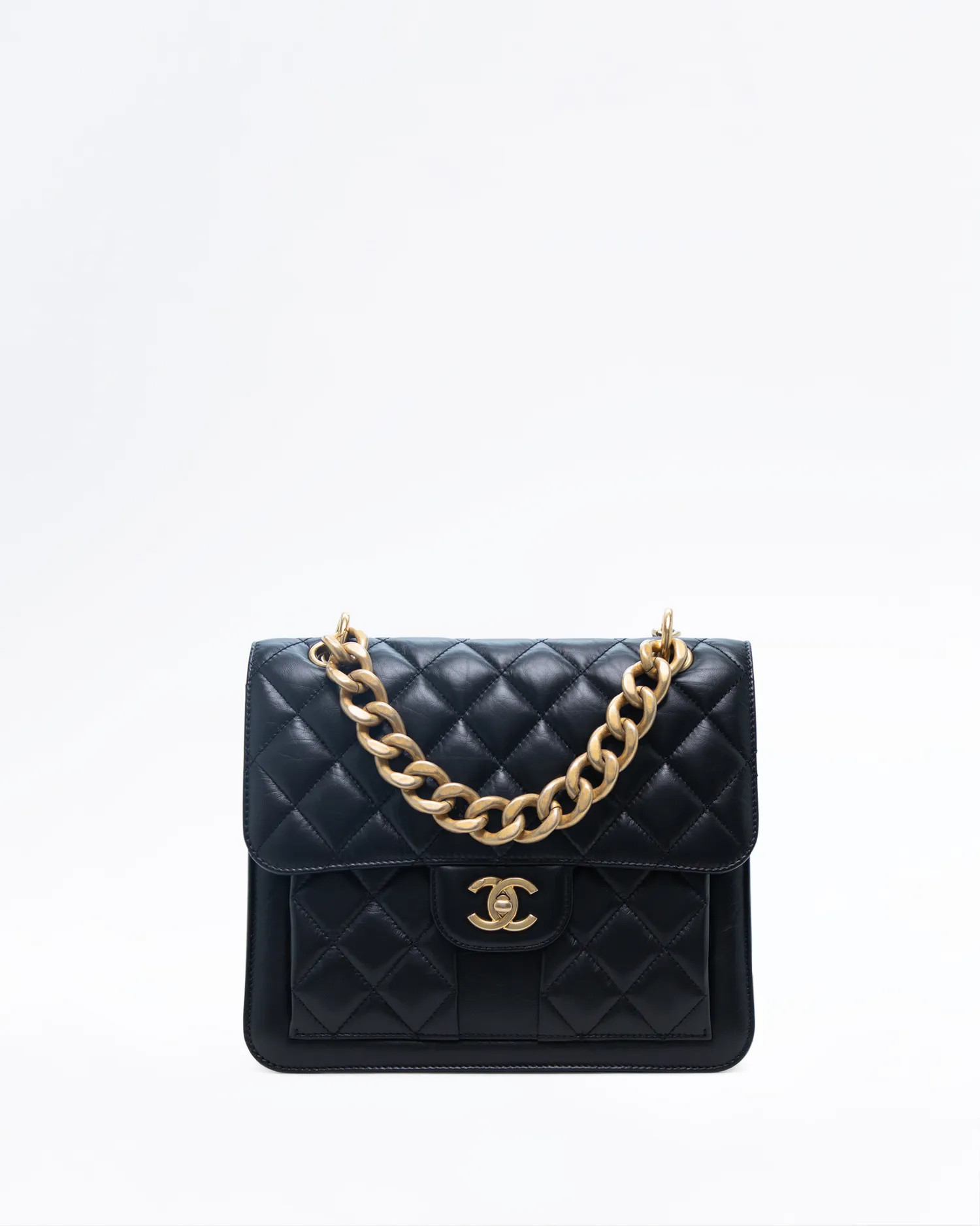 Quilted Double You Flap Backpack | Vivrelle