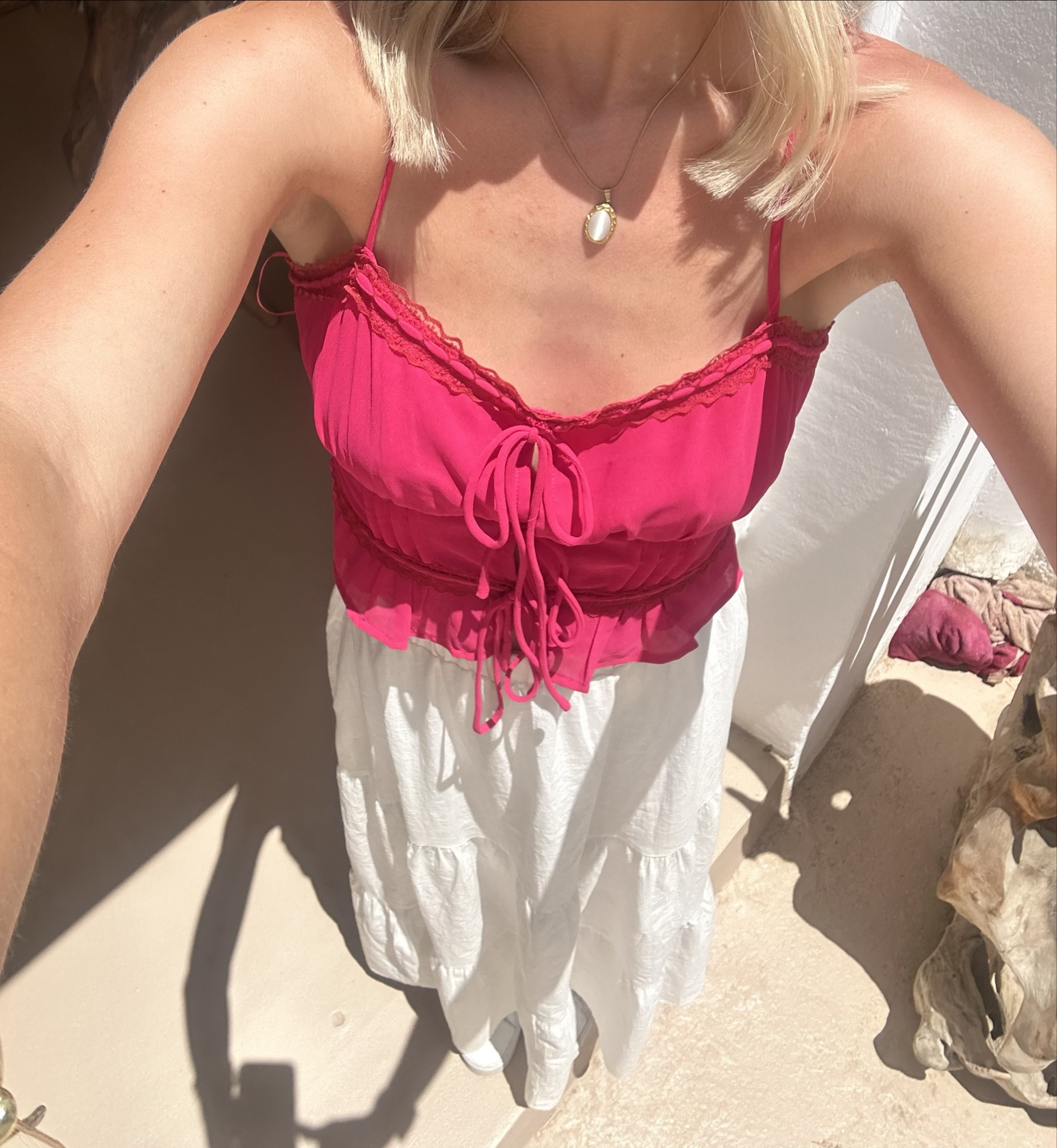 simple, bright & fun summer outfit! love this pink. wore this outfit in Mykonos, Greece ;) Top is Pitaya I can’t find similar unfortunately <3 

pink tie top, pink summer top, long white skirt, summer outfit, European summer outfitt 

#LTKTravel #LTKStyleTip #LTKVideo