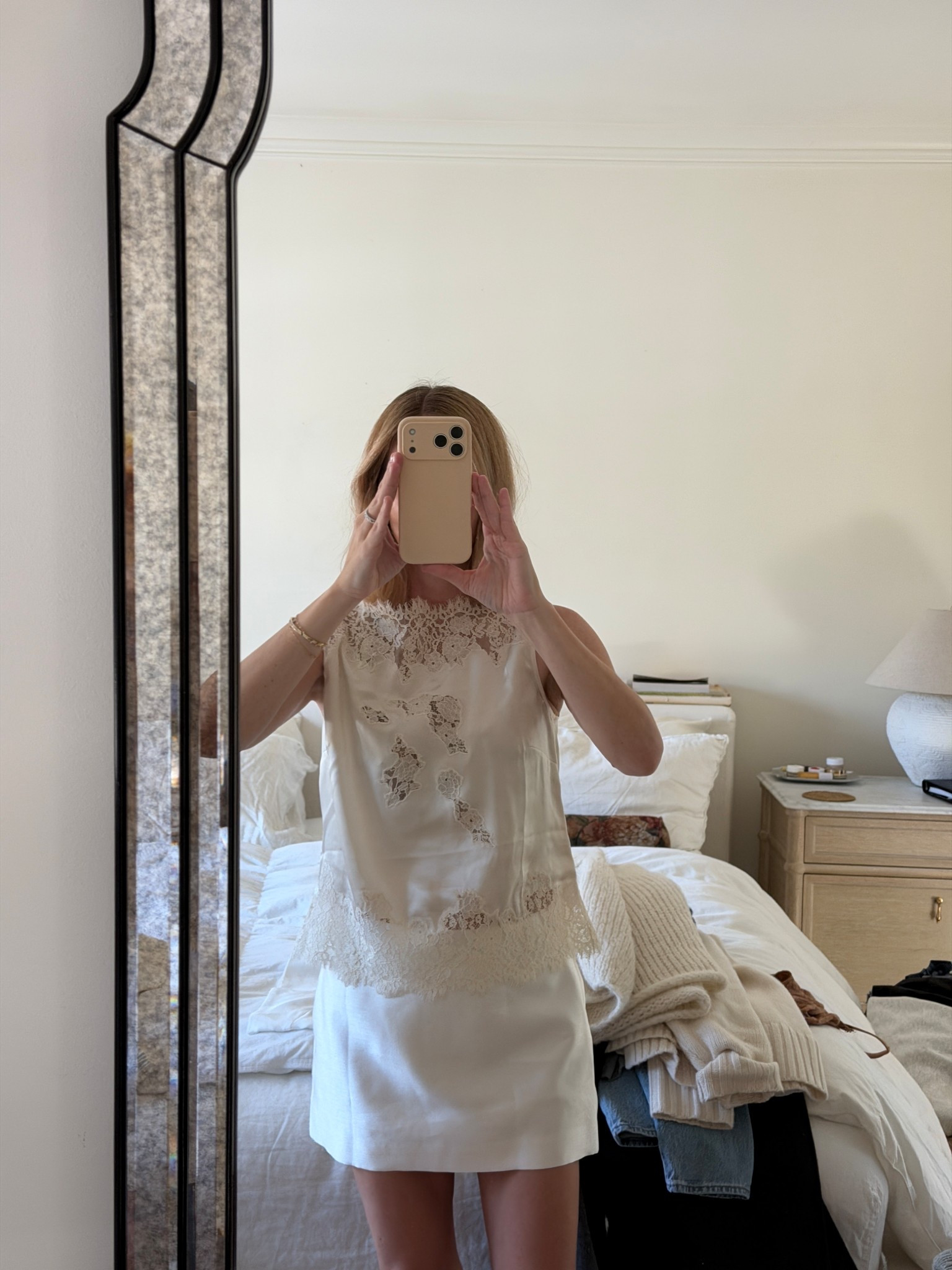 Adore this top, it's stunning. I am in a small, you could size down if between sizes! Also this skirt has the most beautiful sheen to it. I bought it to wear under a sheer dress but will be wearing with casual tees, too, it's so fun!  

 